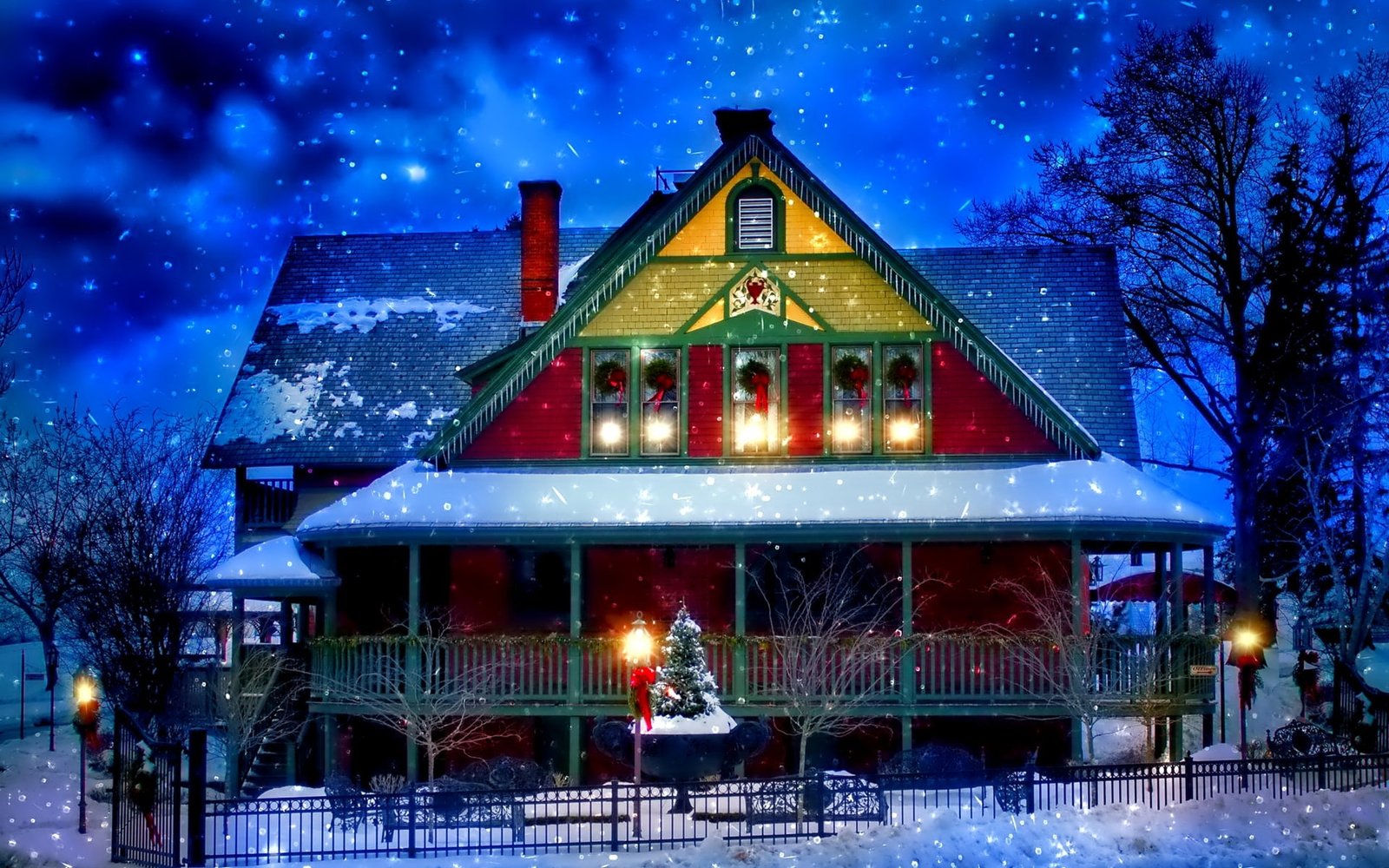 Snow winter house New Year Christmas lights trees evening blue red and yellow