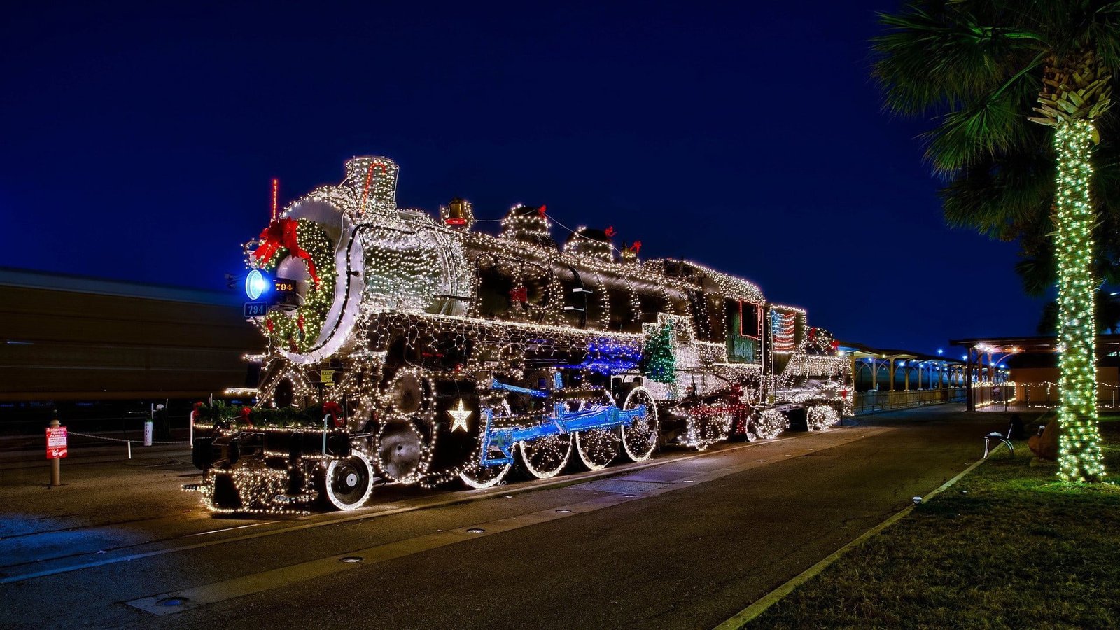 train with string lights steam locomotive christmas