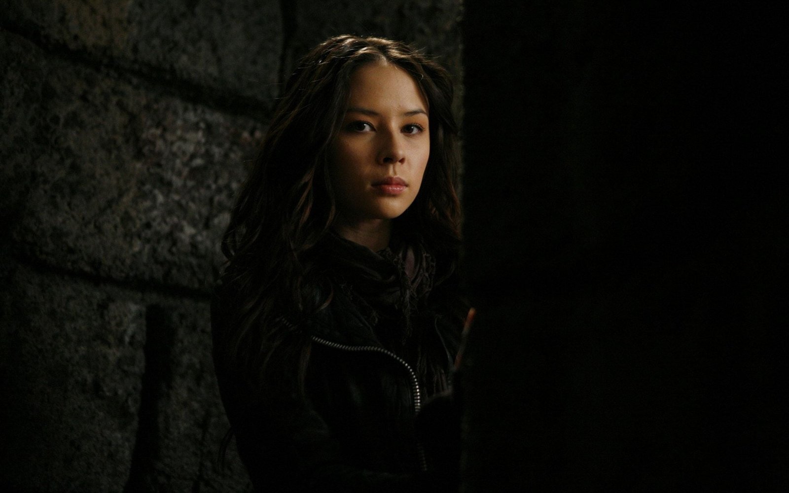 women's black top malese jow actress face dark portrait