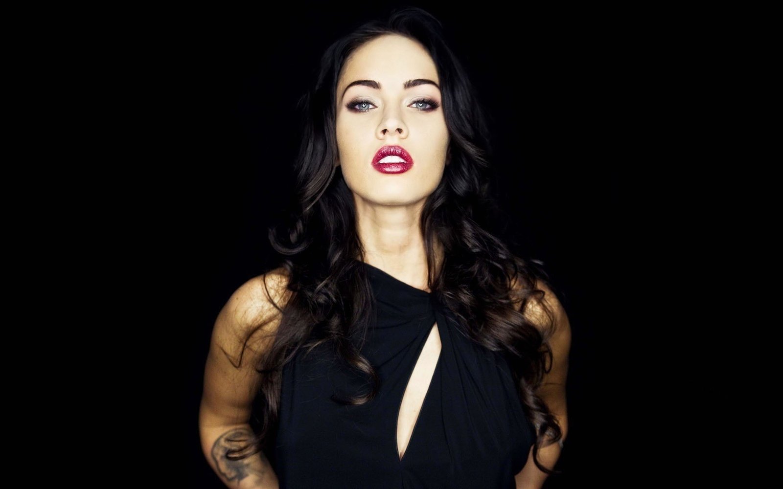 Megan Fox black background red lipstick women makeup actress