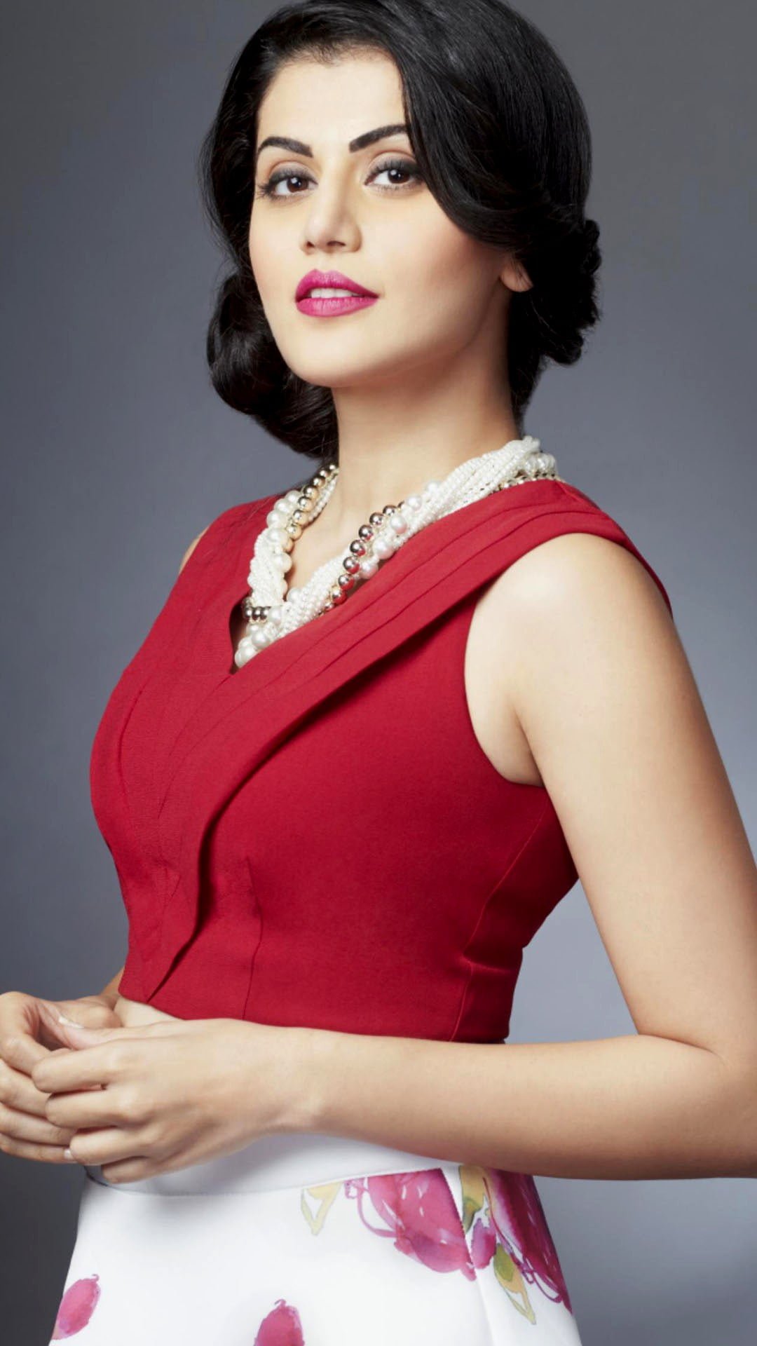 Taapsee Pannu Actress women's red and white floral sleeveless dress