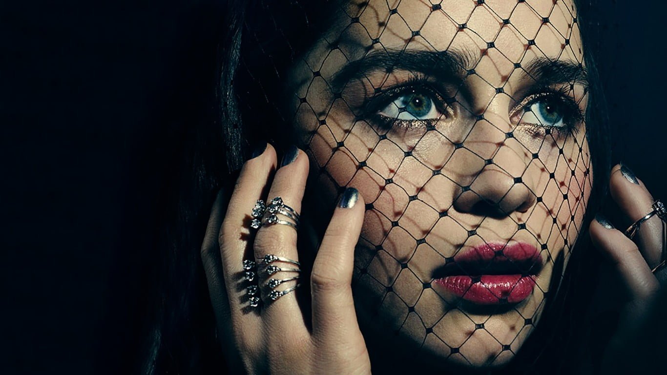 two silver colored rings Emilia Clarke actress closeup blue eyes