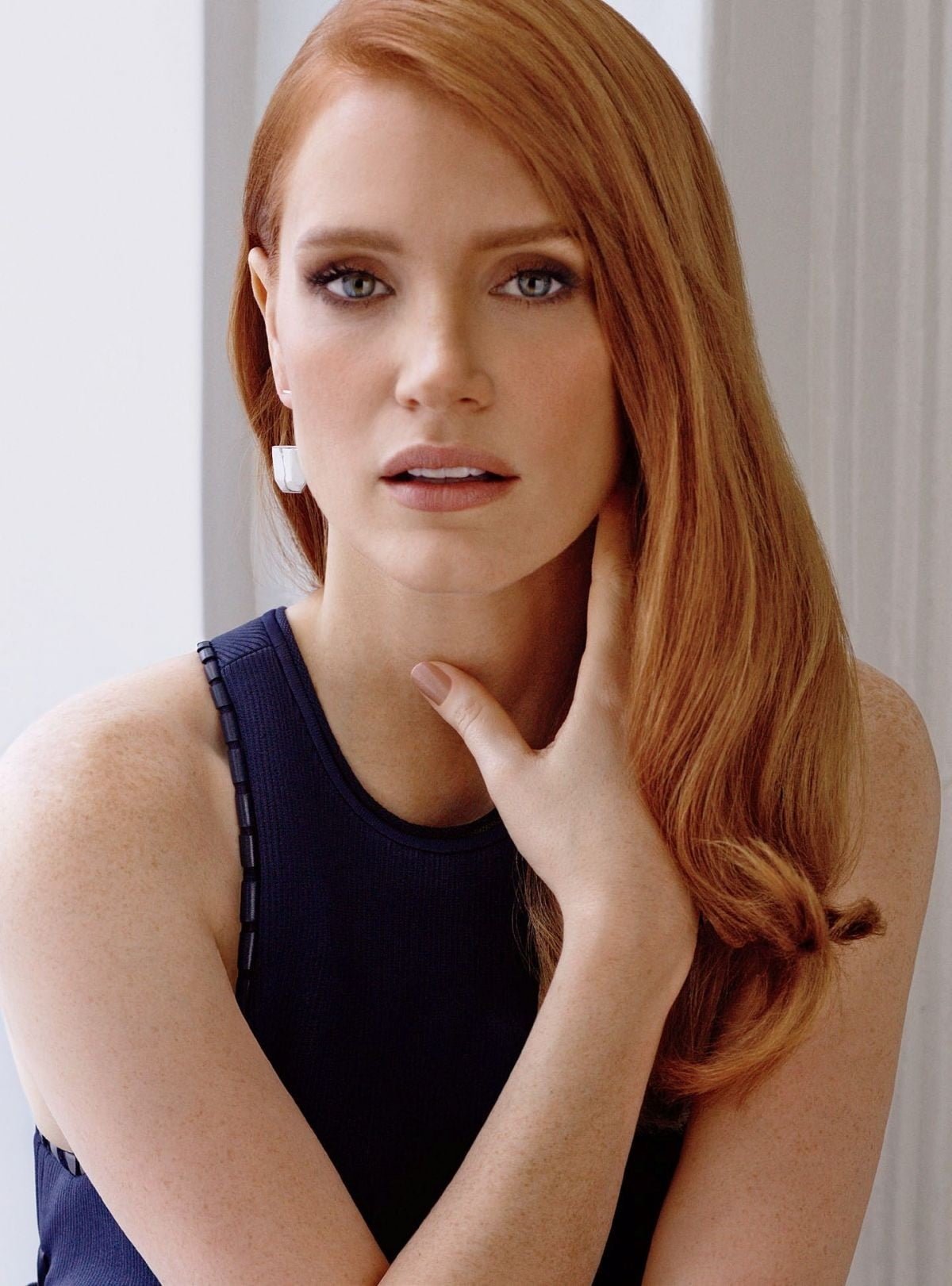 woman wearing purple sleeveless tops Jessica Chastain actress