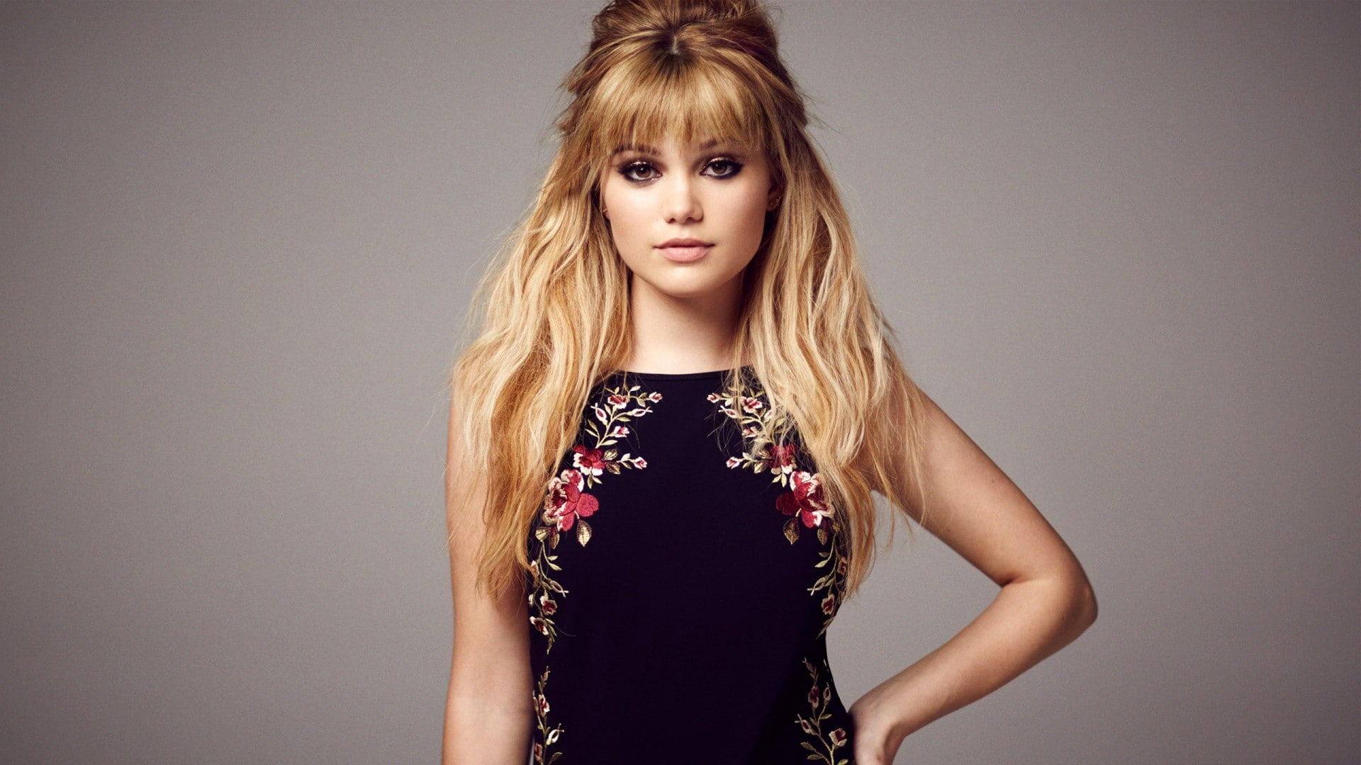 women model Olivia Holt actress hands on hips blonde brown eyes