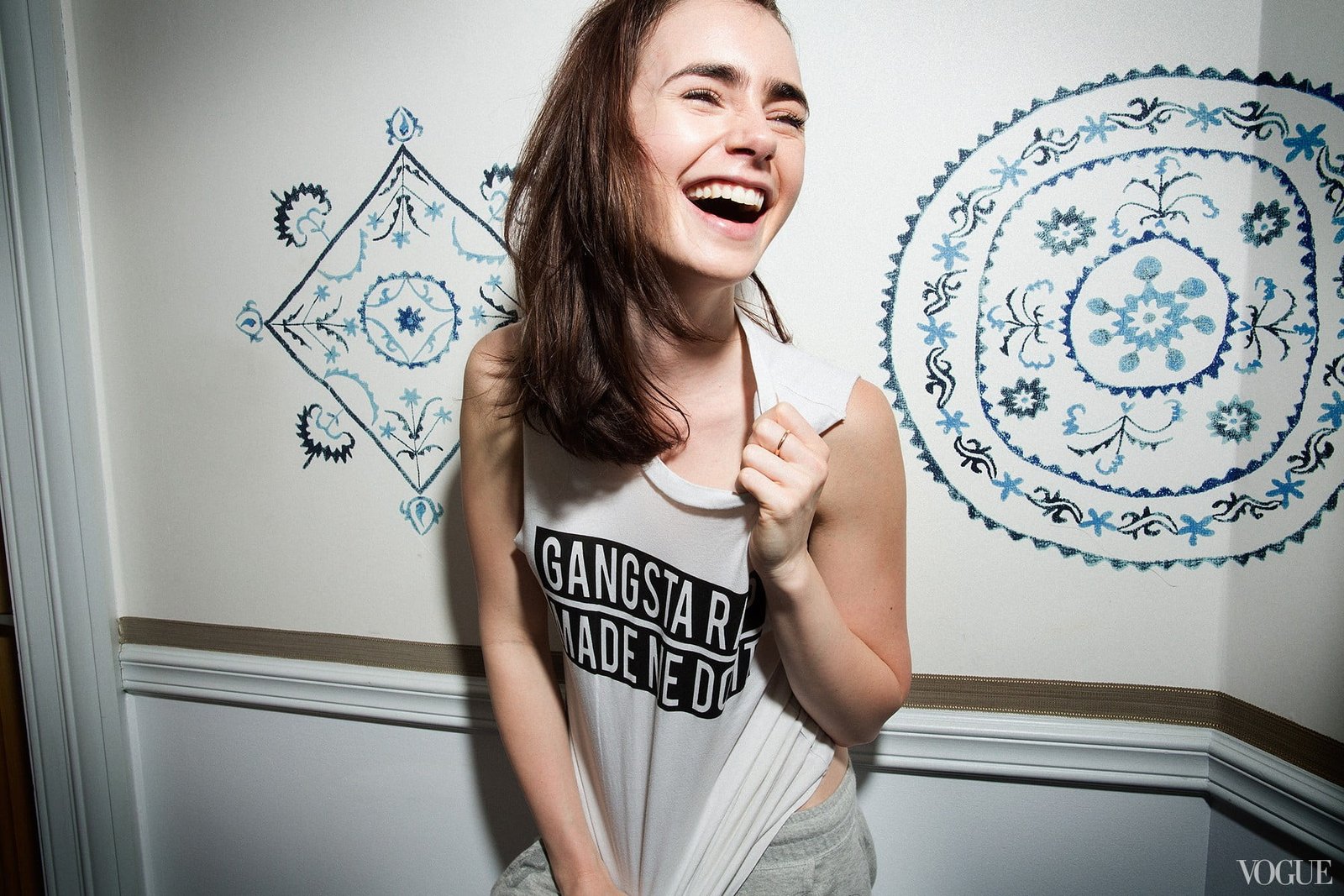 women's gray tnak top Lily Collins laughing indoors T shirt