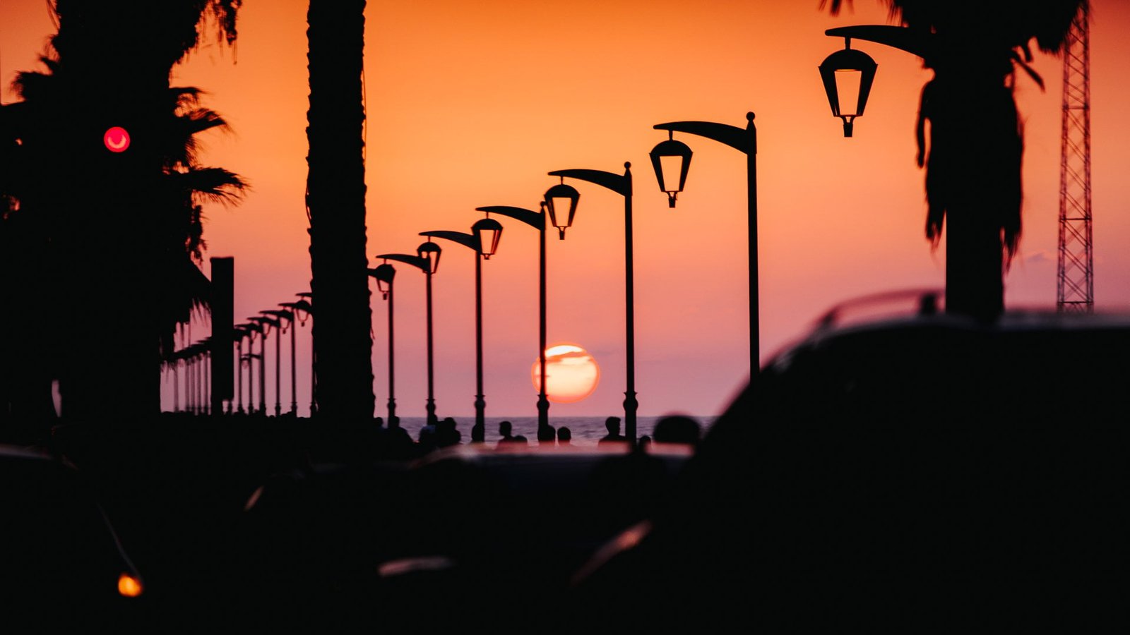 sunset beach palm trees car utility pole OutRun silhouette 2k