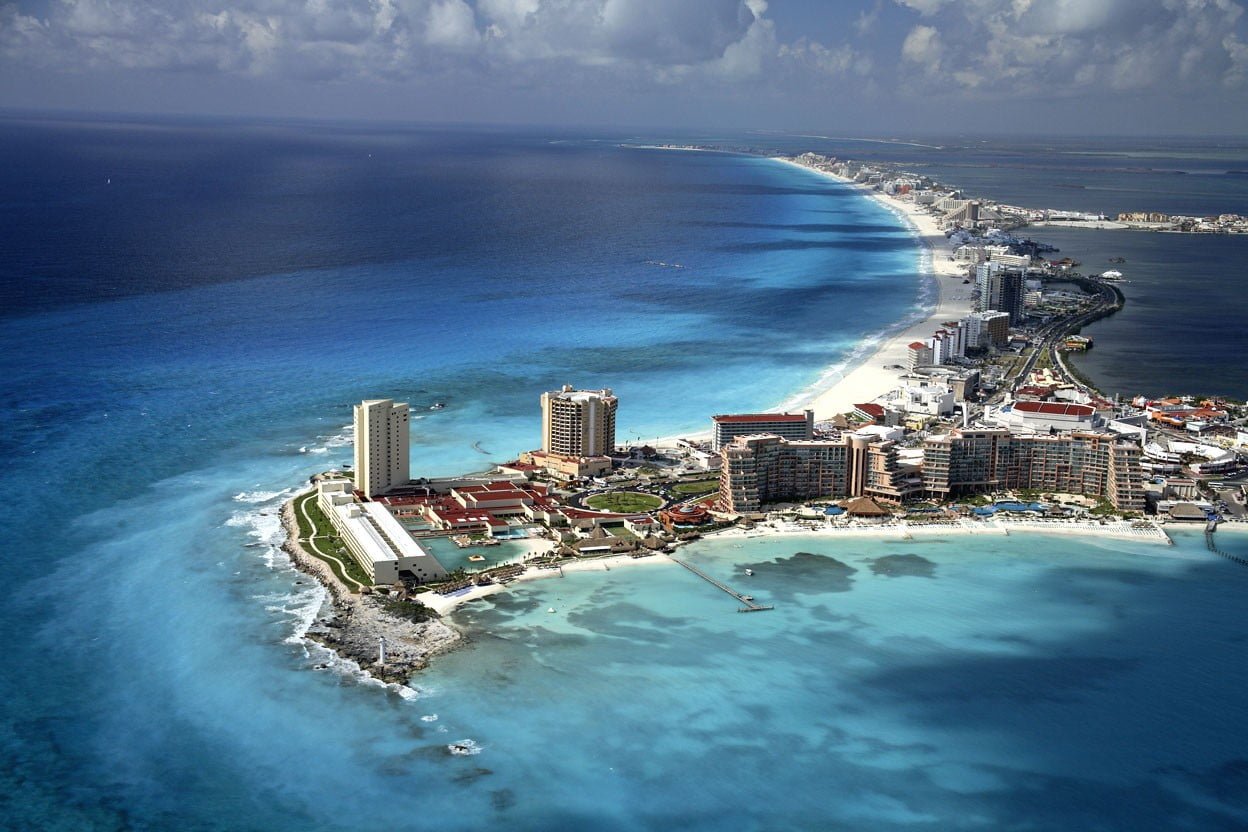 area photography of building near beach sea Mexico yucatan