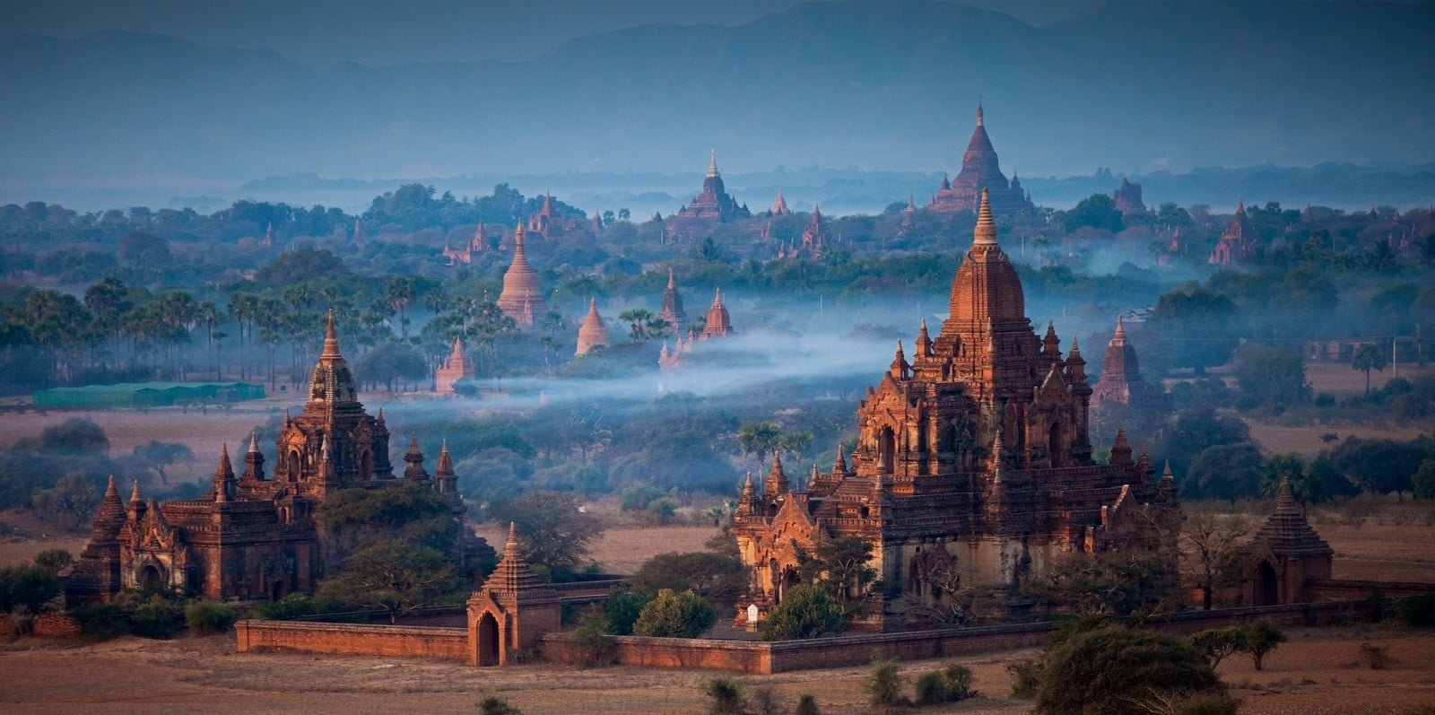 Angkor Wat Cambodia panoramas Buddhism temple mist trees 2k