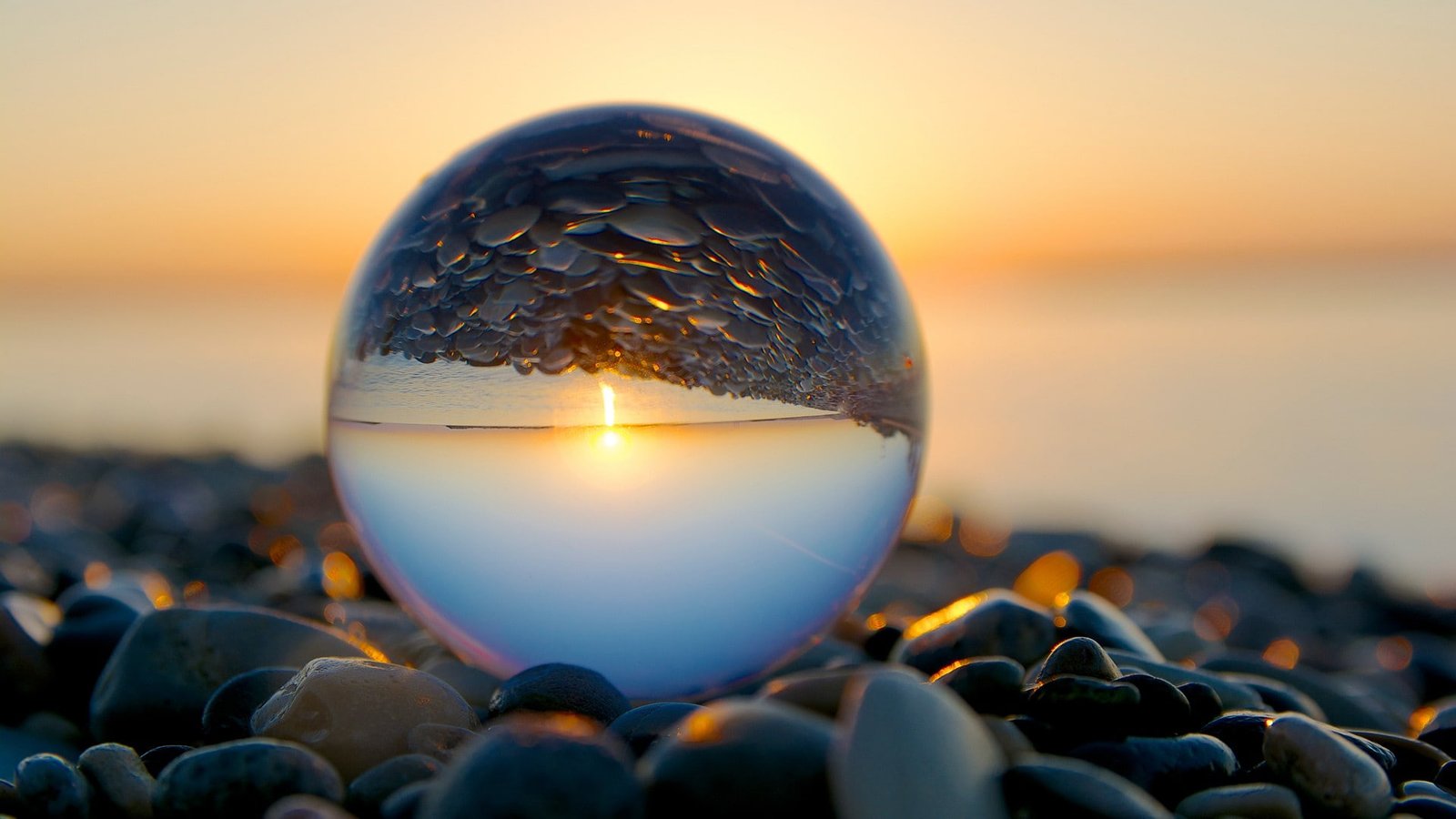 beach reflection marble pebbles sphere sunset sky nature 2k