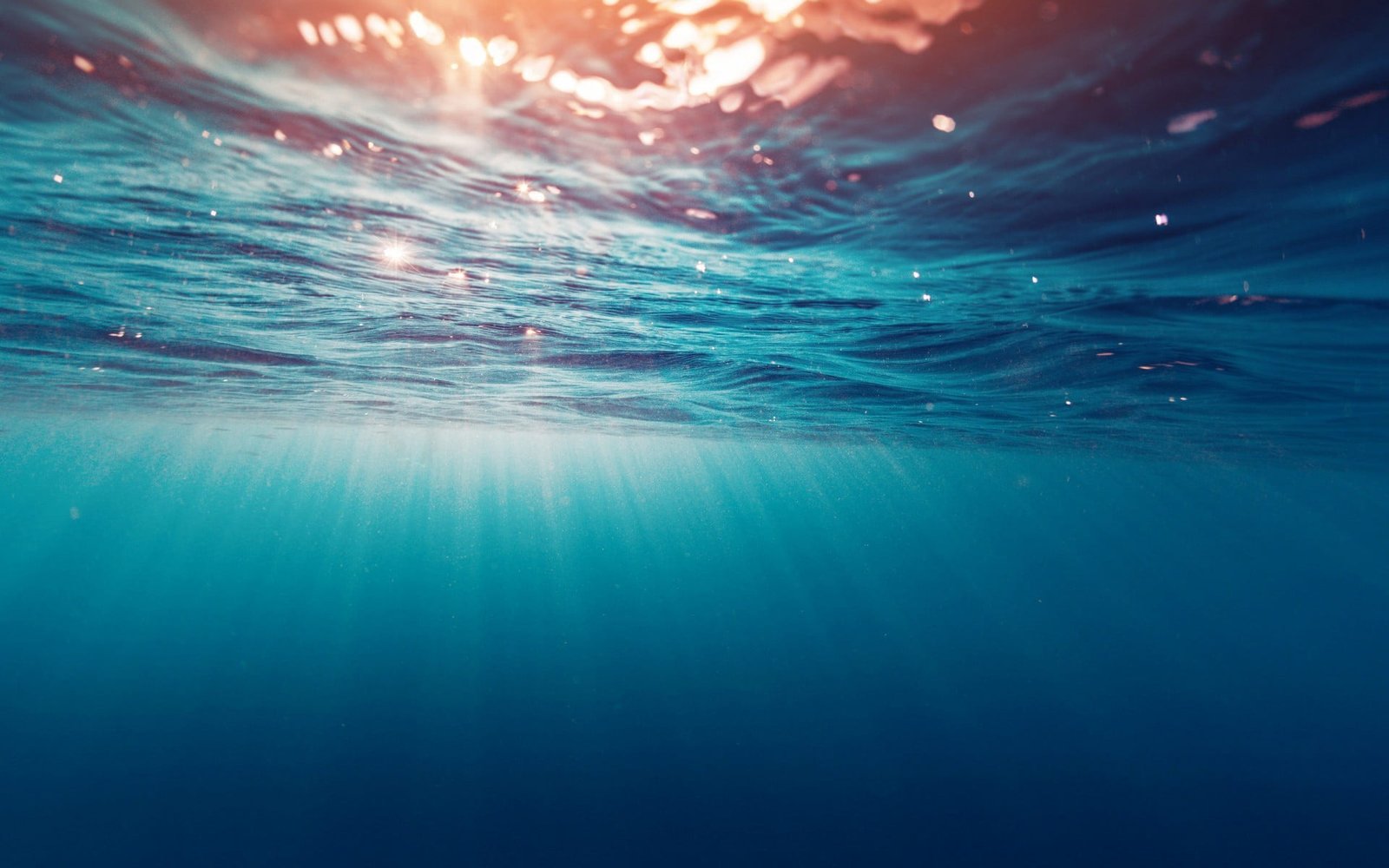 blue water sunrays passing through underwater sun rays nature 2k