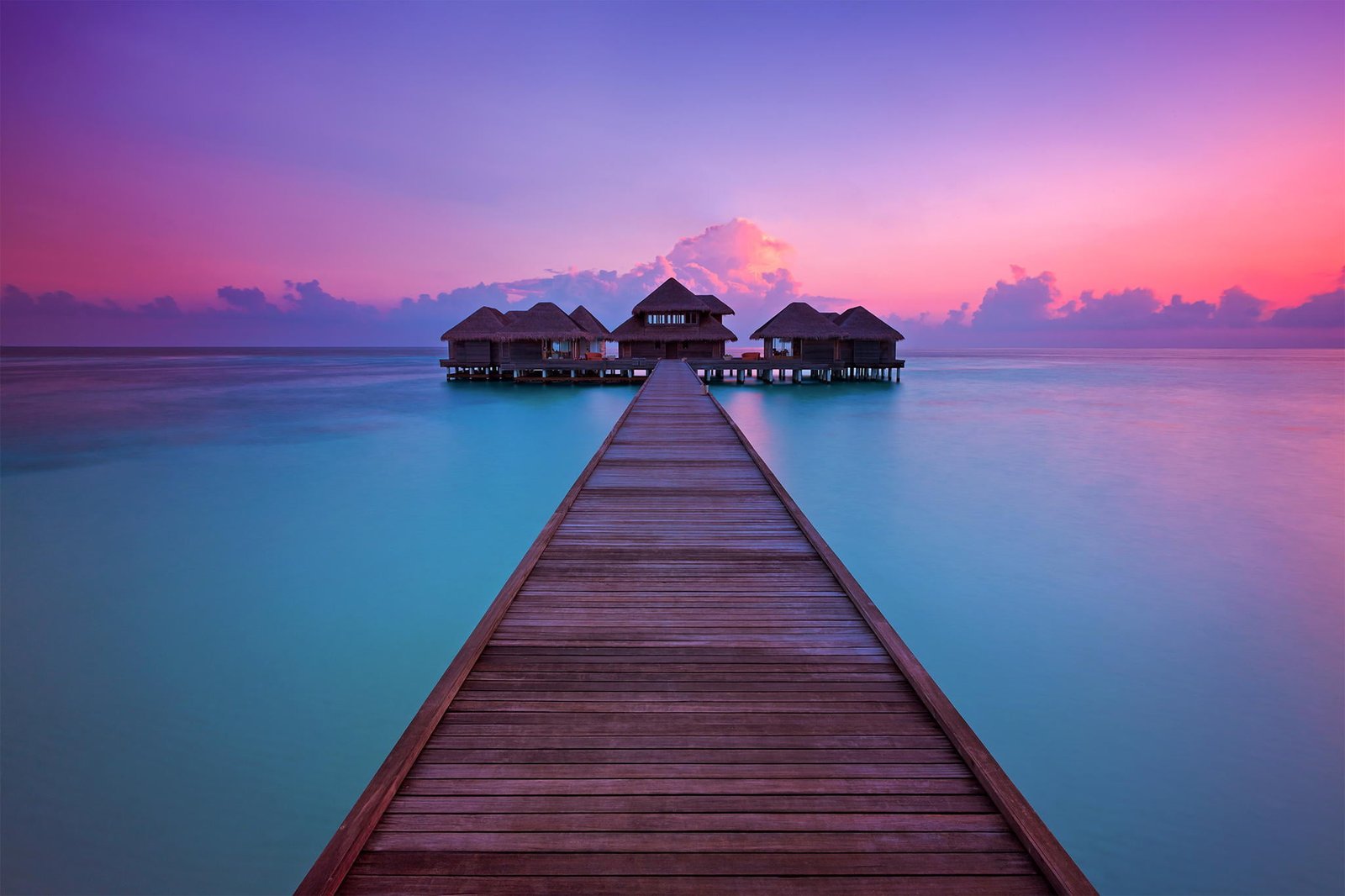 brown dock sunset the ocean pierce resort Bungalow Maldives 2k