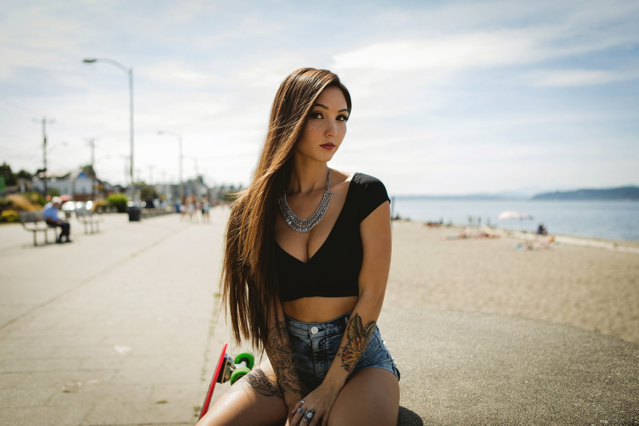 women's black V neck crop top Kristina Chai beach model jean shorts 2k