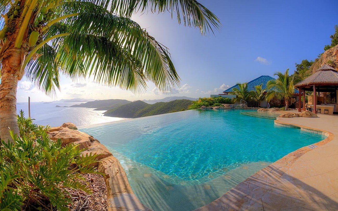 Nature Landscape Resort Swimming Pool Palm Trees Sea Tropical Summer Vacations Water infinity pool overlooking mountains and ocean