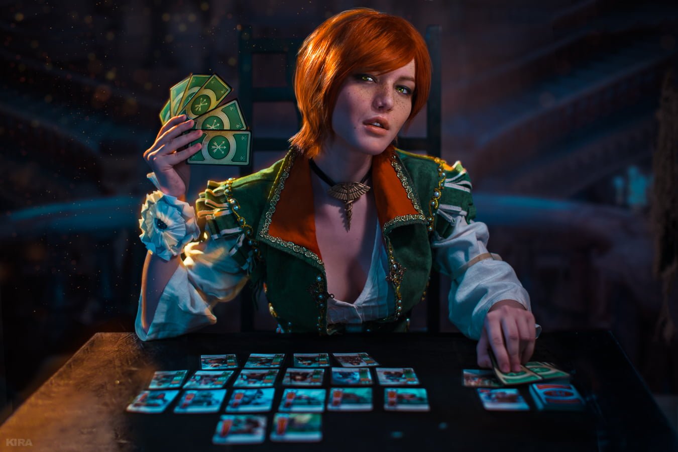 Lada Lyumos playing cards looking at viewer freckles redhead