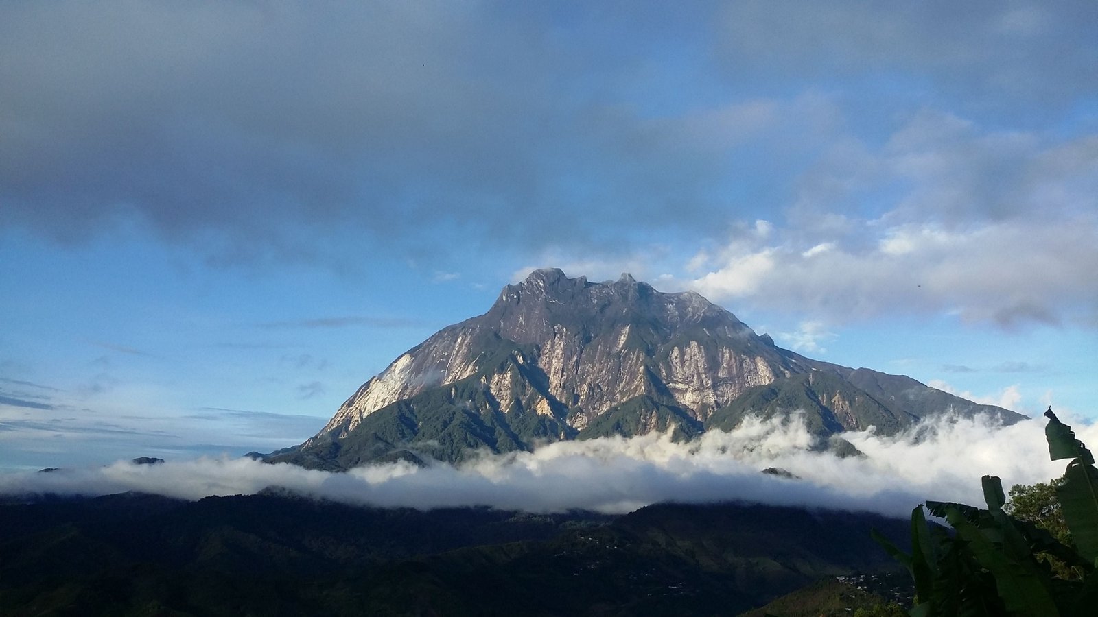 mountain surrounded by clouds Mount Kinabalu Sabah World heritage 2k