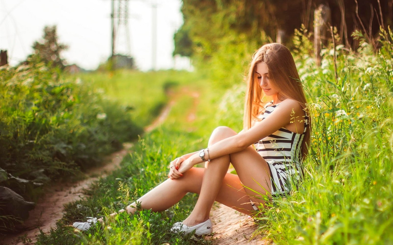 Girl in summer relaxation nature grass 2k