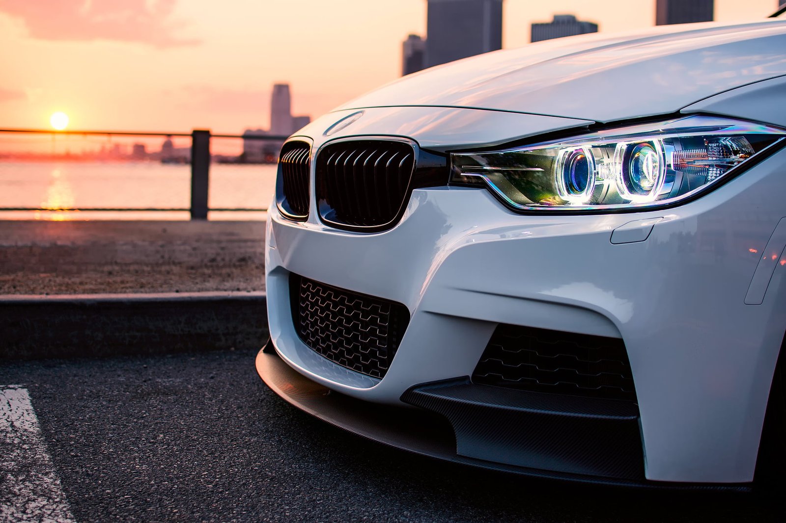white BMW 3 series the sun light city I car 2k