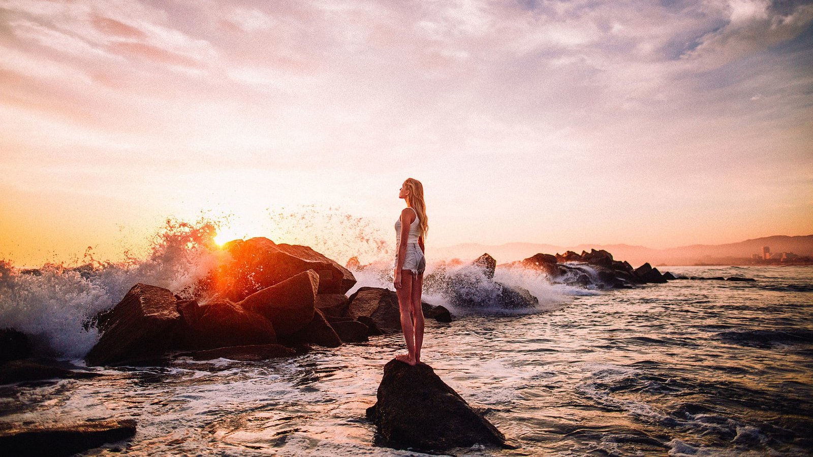 sea women beach water rock object solid sky sunset 2k