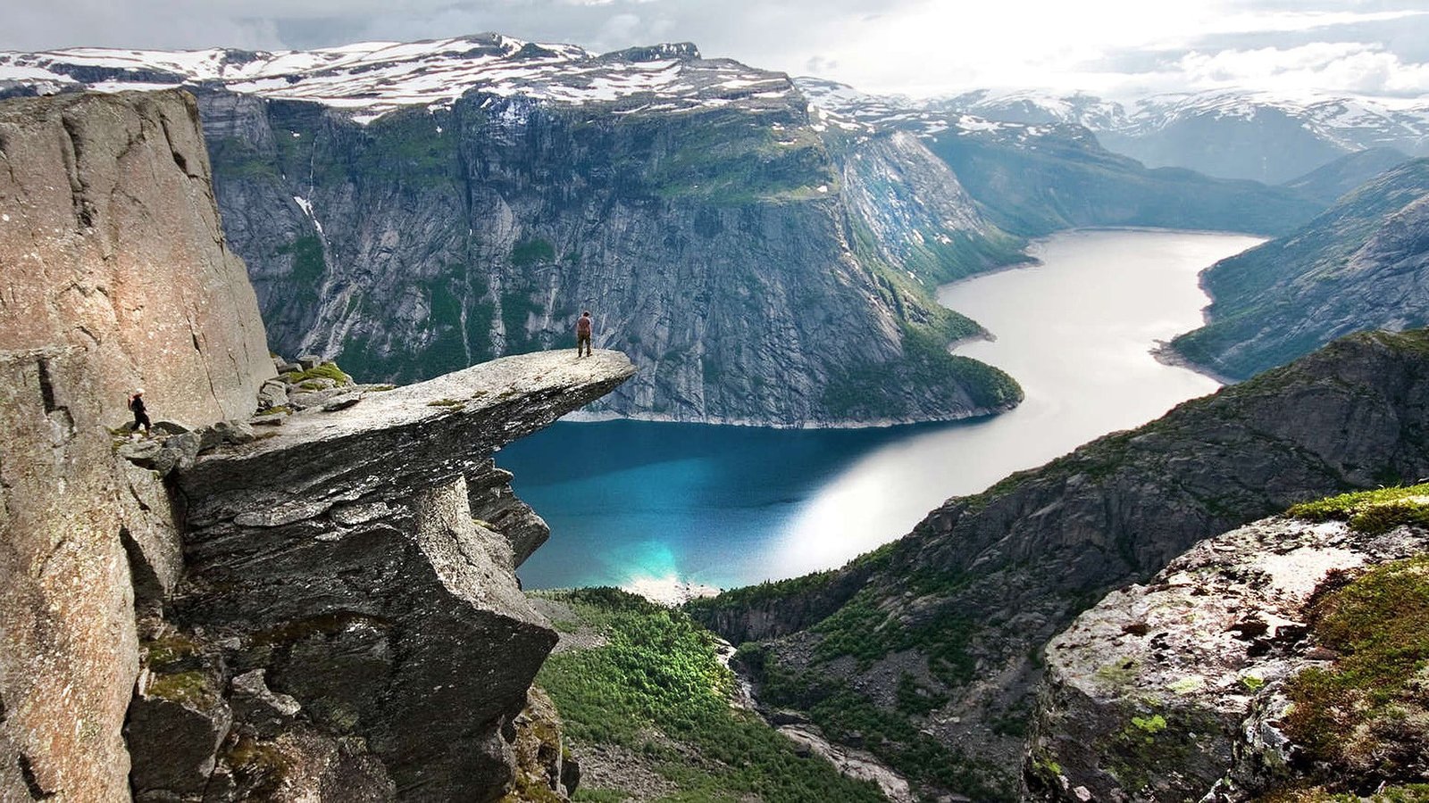 green grass and clear body of water fjord sea cliff canyon 2k