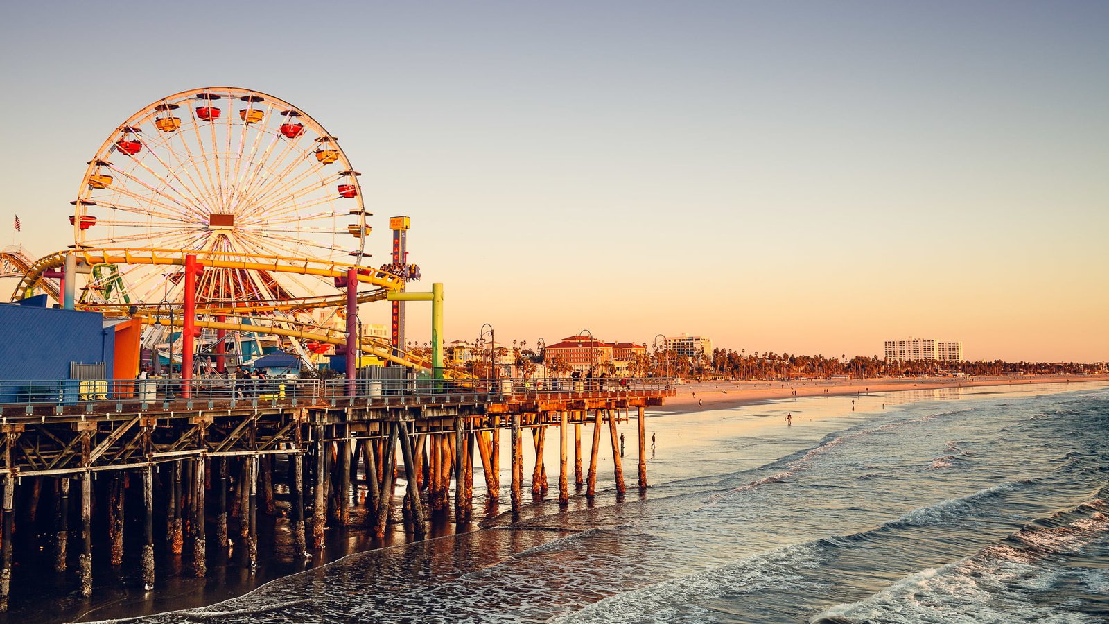 Santa Monica Pier wave beach the sky sunset people Ferris wheel 2k