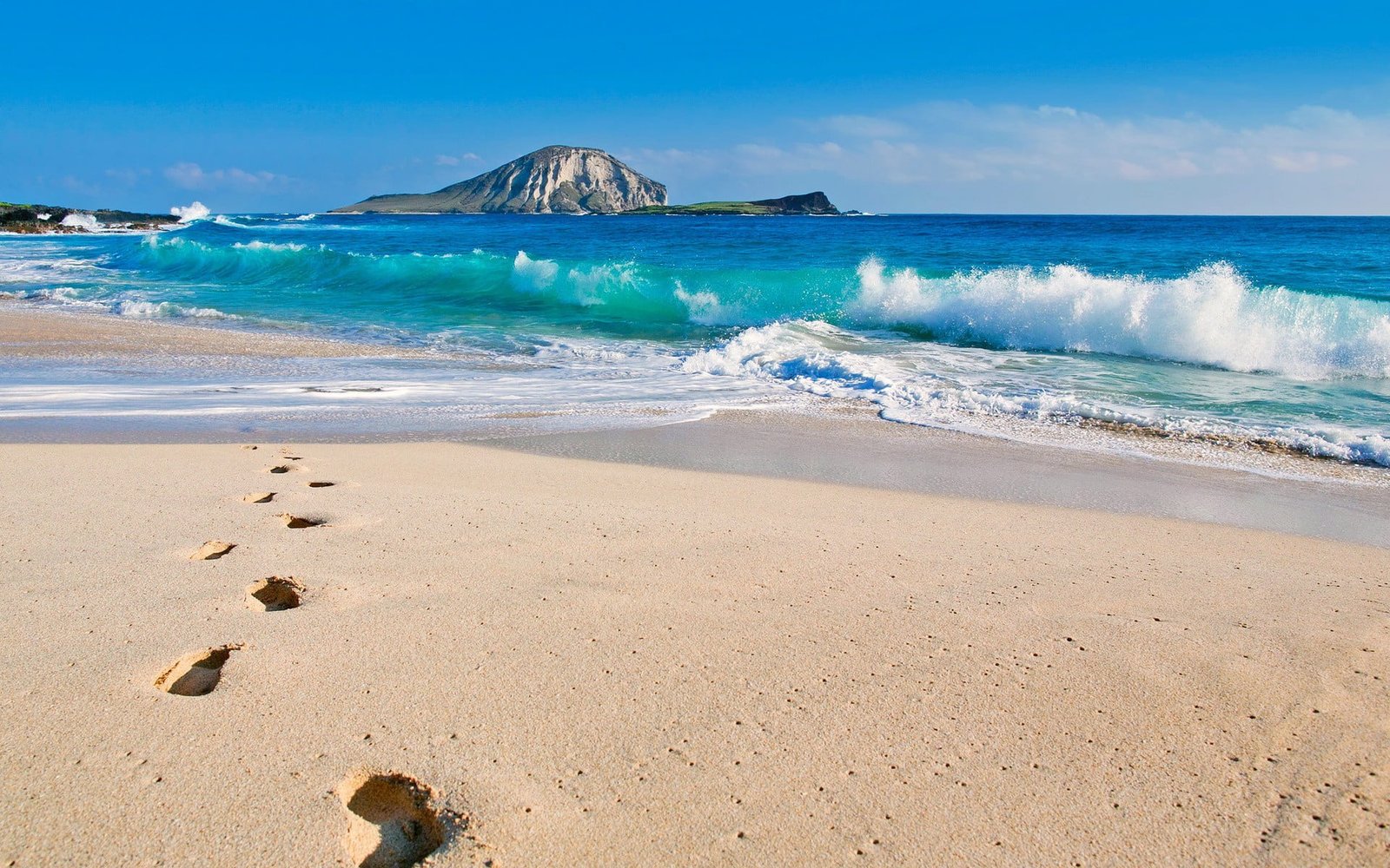 sea waves and sand footprints beach nature water land beauty in 2k