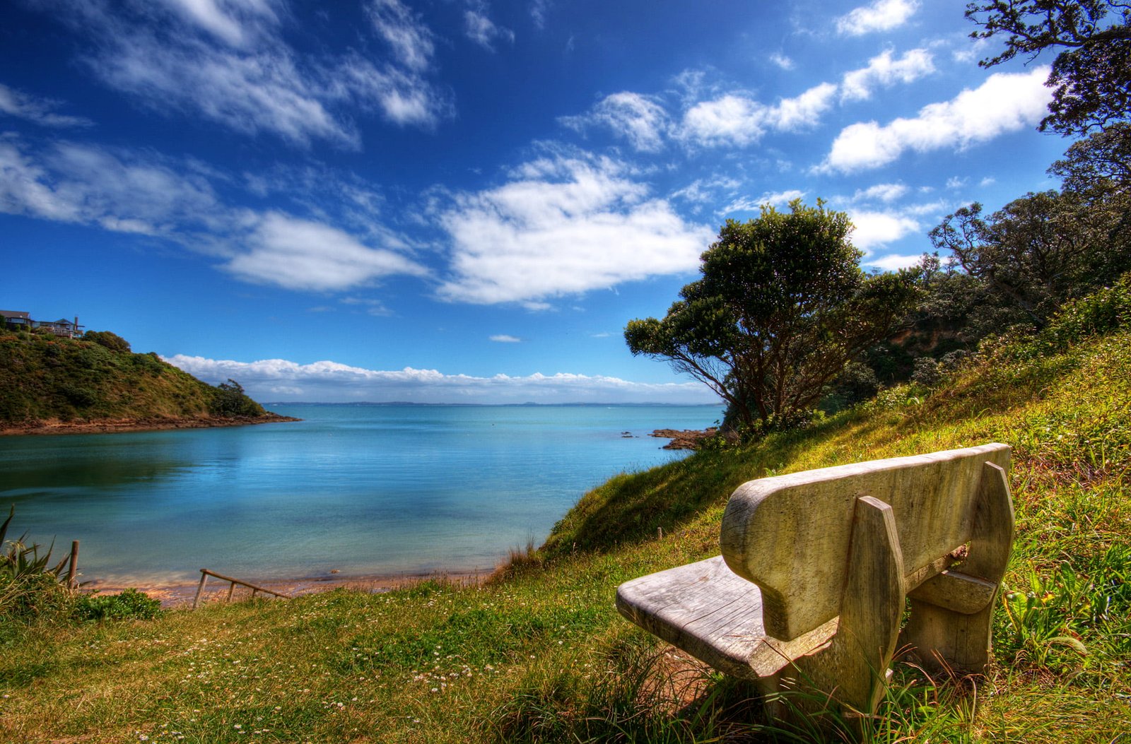 bench on land near beach during daytime Lookout water ocean sea 2k
