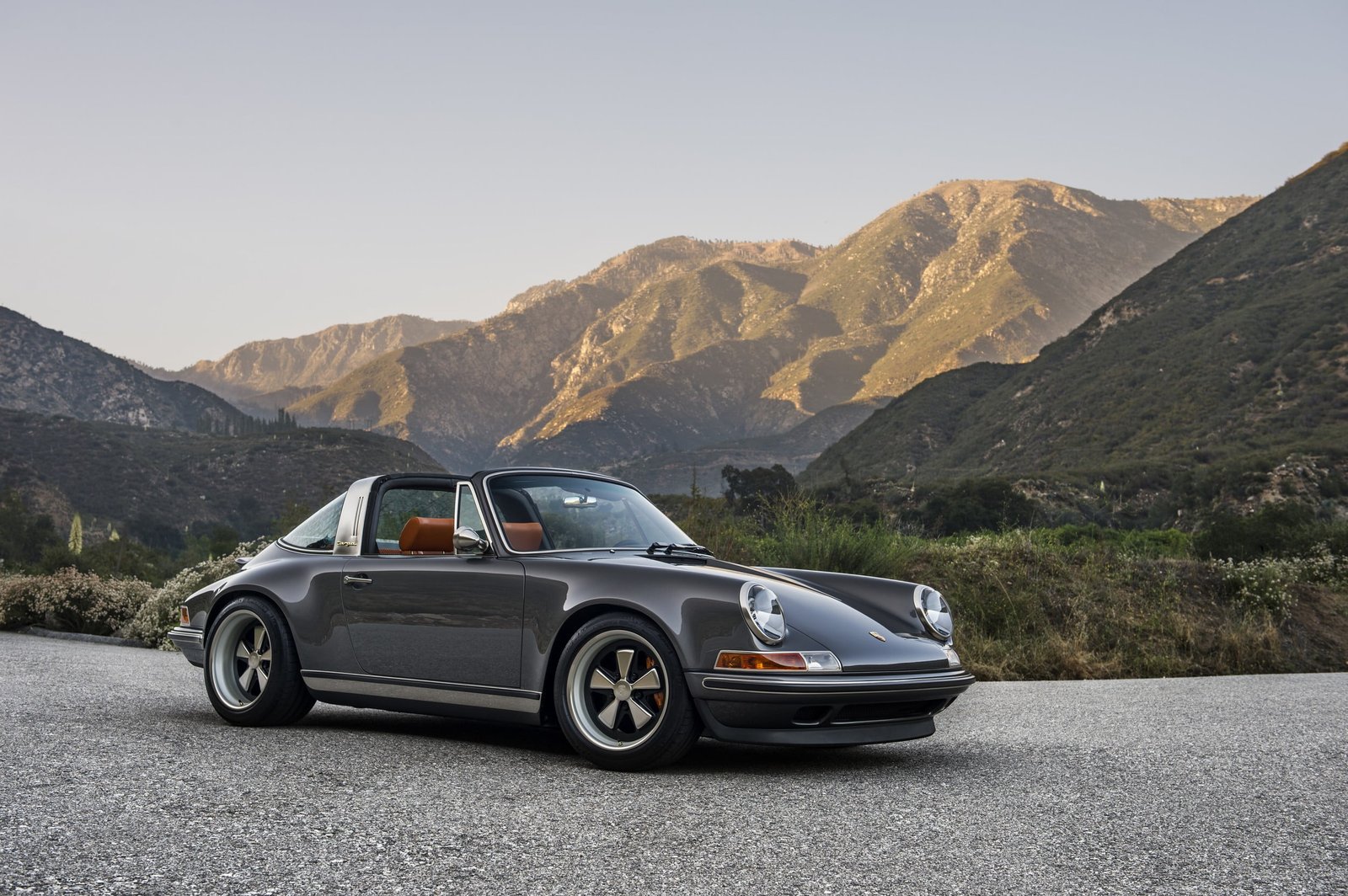 gray Porsche coupe targa transportation mode of 2k