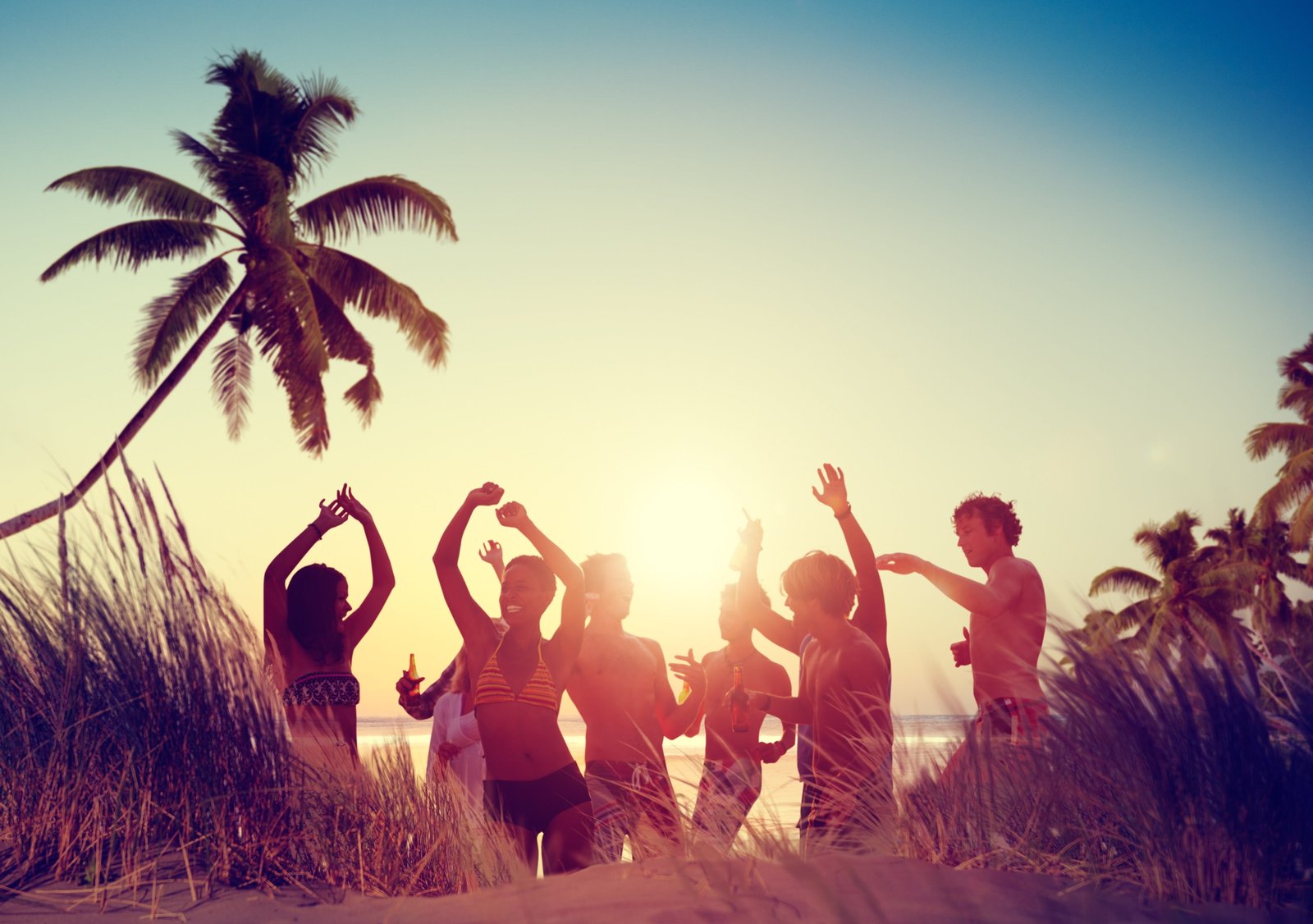 dancing men and women during sunset beach party family silhouette 2k 4k