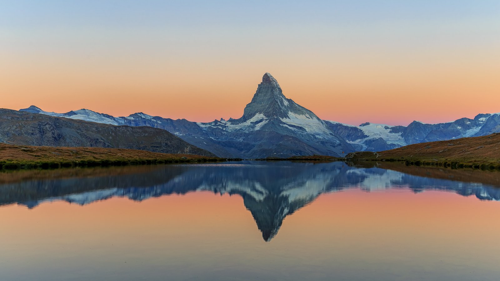 body of water and mountain during daytime Daybreak am Zermatt 2k 4k 5k