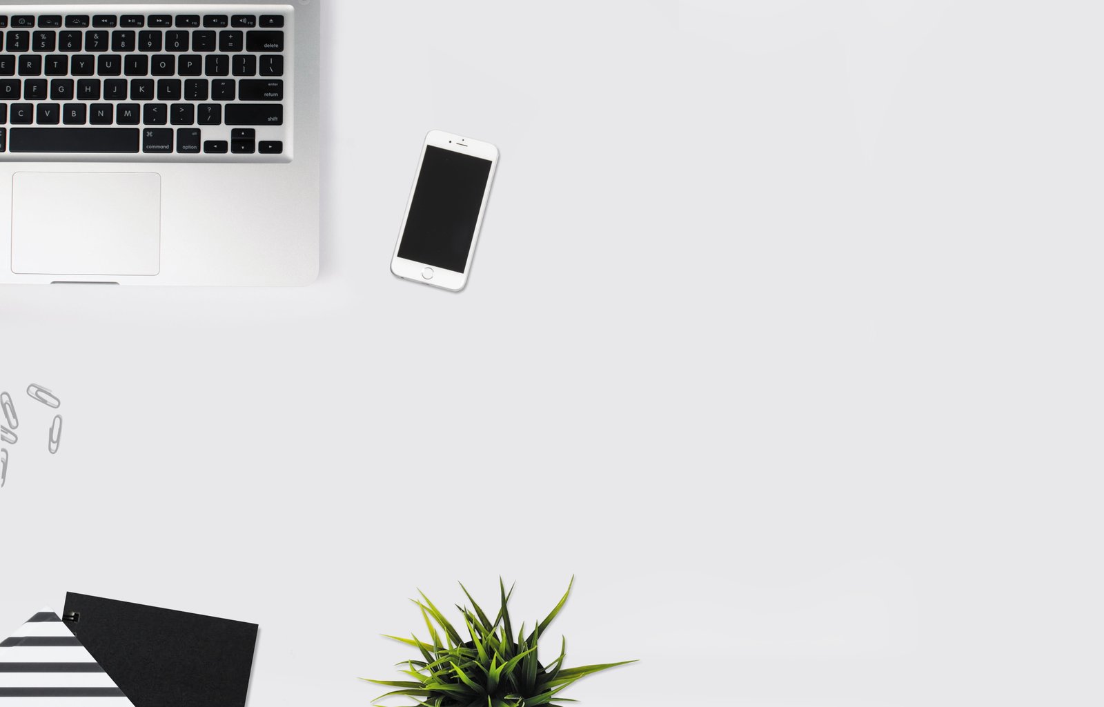 White Smartphone Beside Silver Laptop Computer business desk 2k 4k 5k 8k