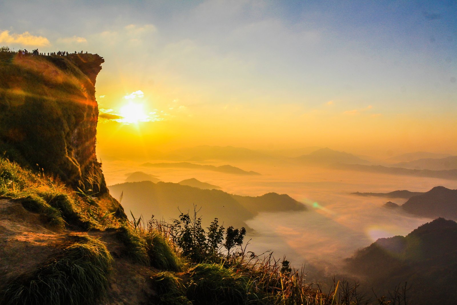 Aerial Photo of Mountain Surrounded by Fog adventure asia background 2k 4k