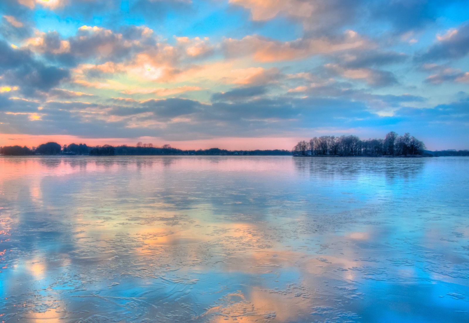 aerial photography of river under blue and white sky frozen 2k 4k