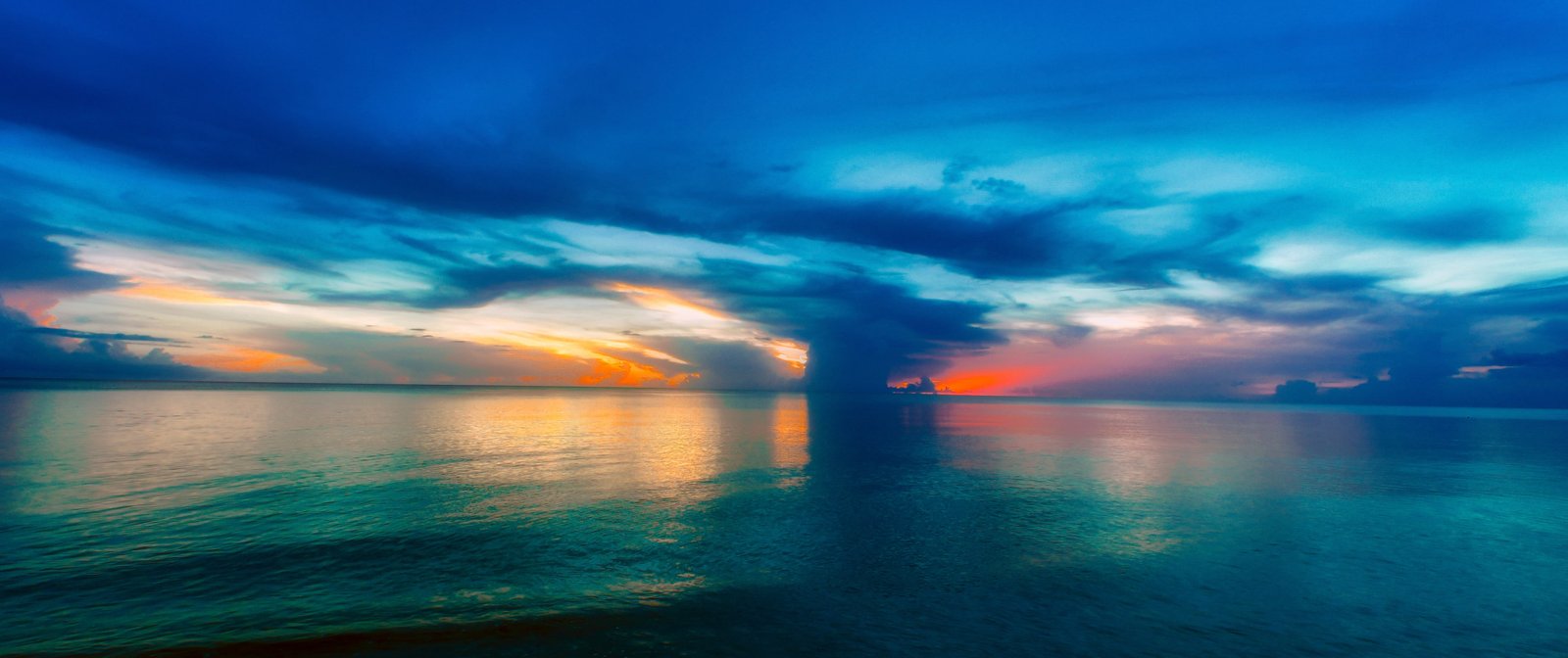 blue skies and clouds with body of water photography during sunset 2k 4k 5k