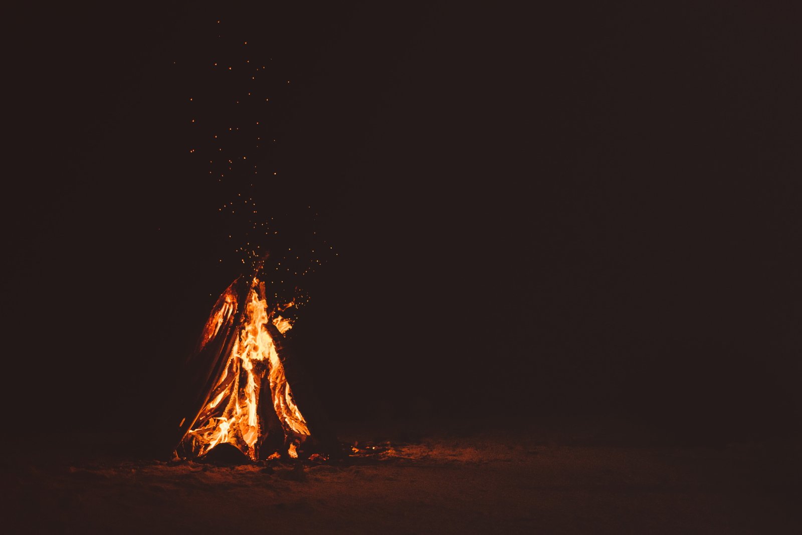 bonfire during night time flame burn campfire dark beach 2k 4k 5k