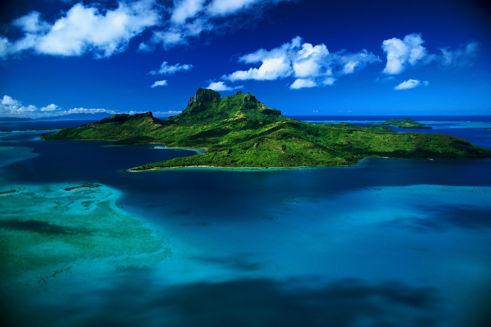 green island under cloudy sky during daytime nature deserted Island 2k 4k