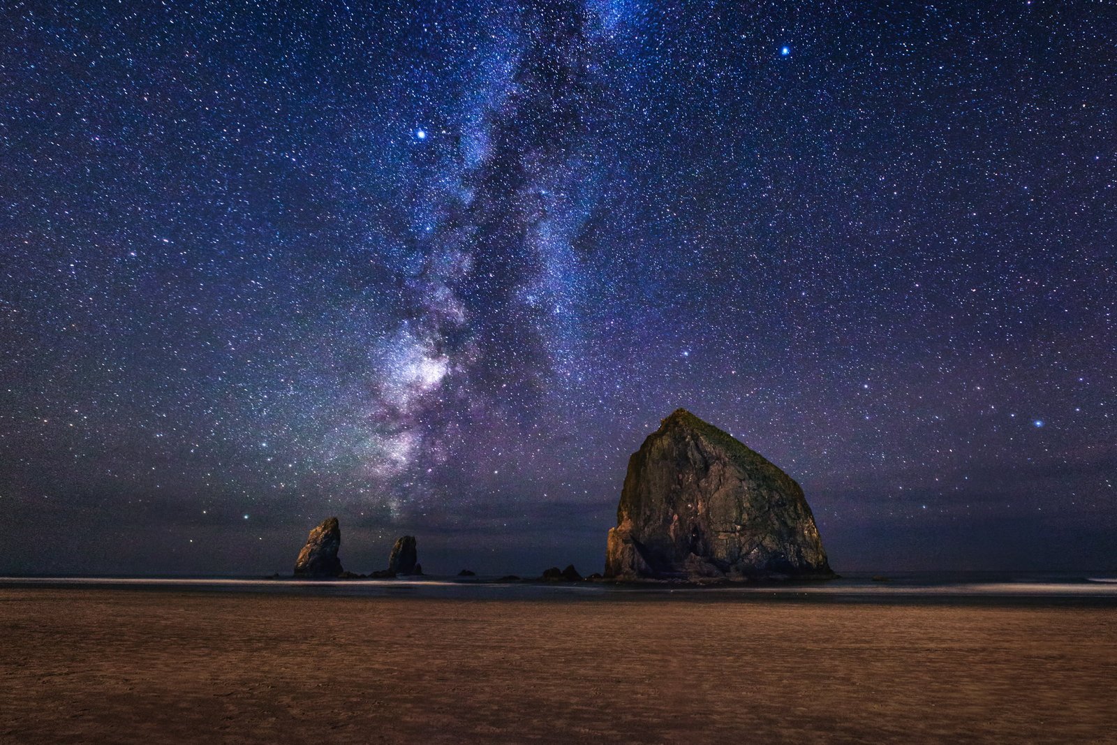 low angle photo of night sky during nighttime cannon beach matti 2k