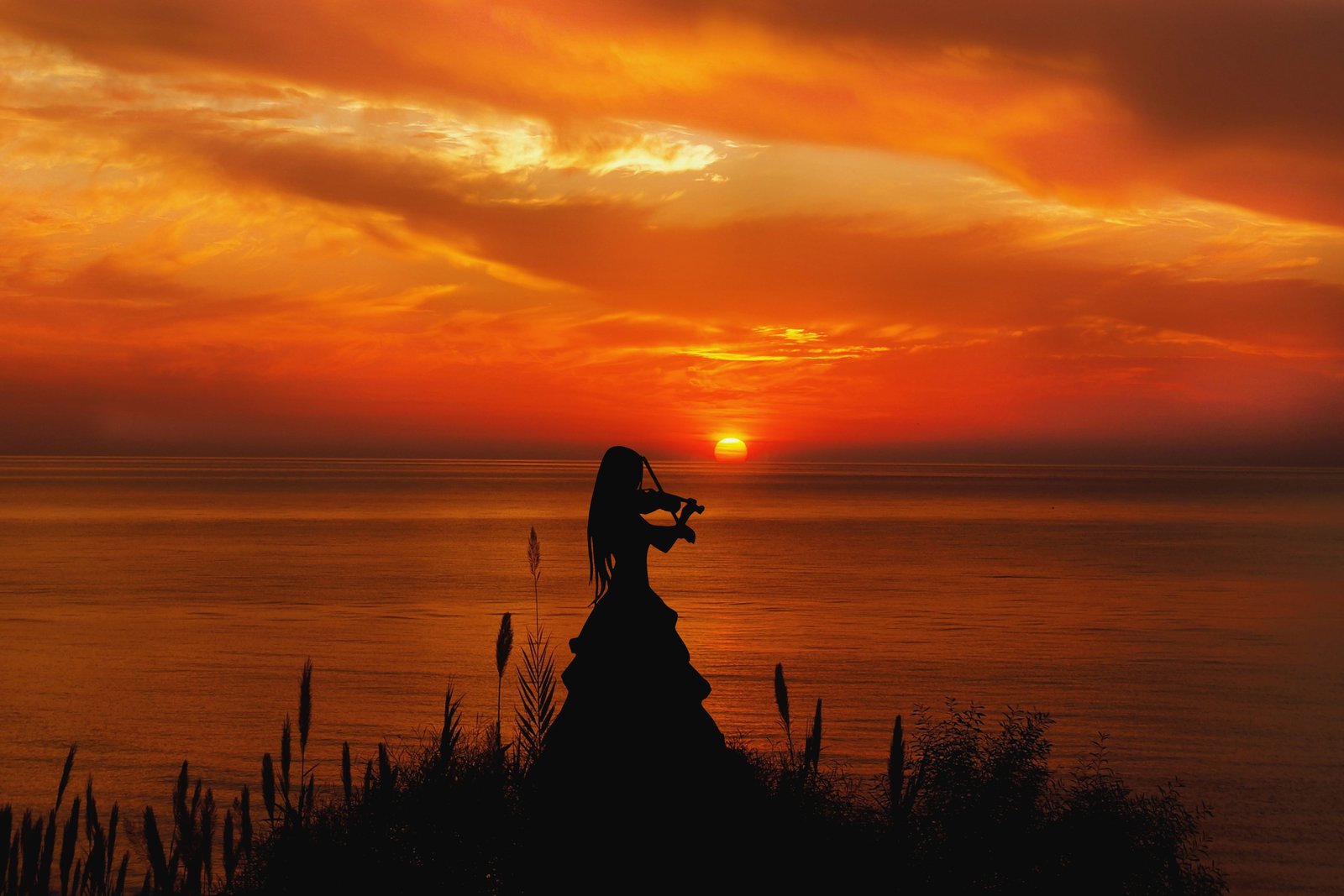 woman playing violin beside water mati the sun west sky clouds 2k 4k 5k