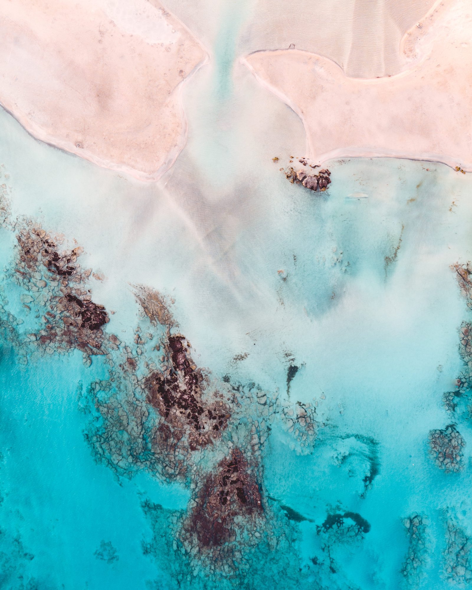 aerial photo of seashore during daytime lagoon beach sand 2k