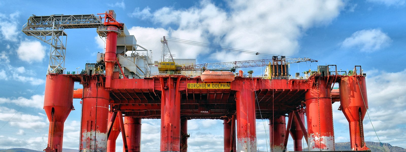 architectural photography of red oil rig platform repairs 2k 4k 5k