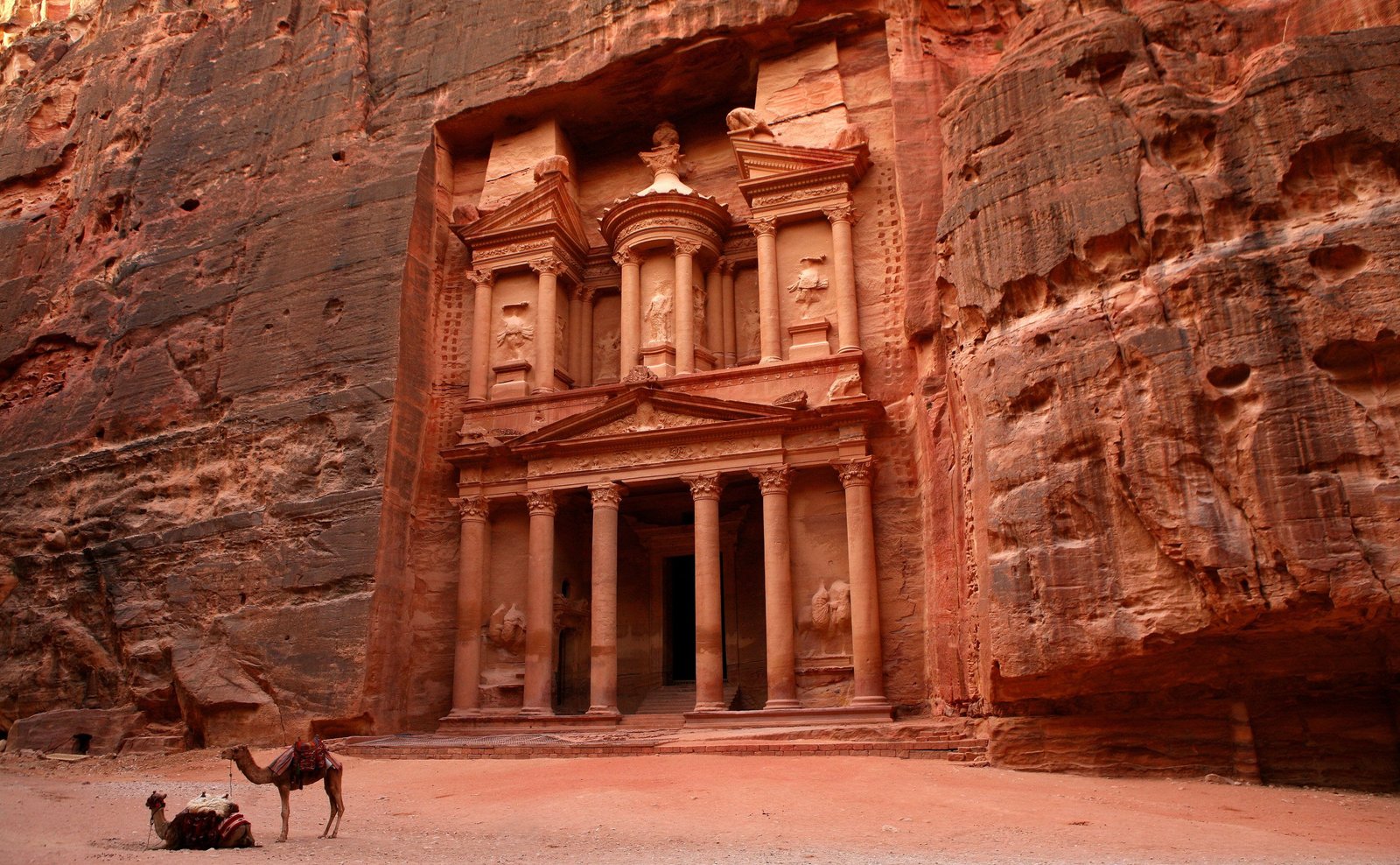 brown concrete building nature landscape desert sand Petra 2k