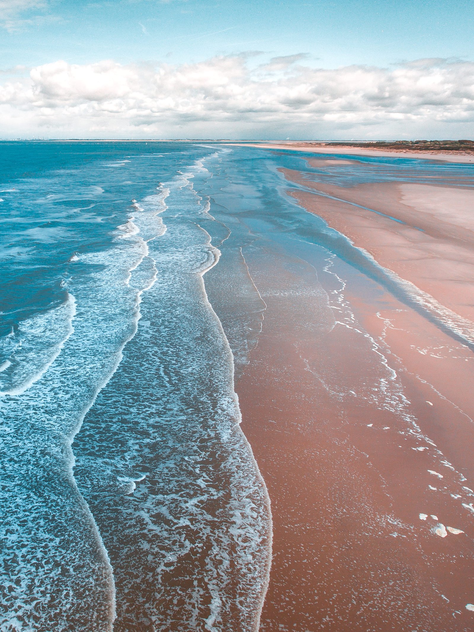 empty seashore aerial photo of beach during daytime iphone backgrounds 2k