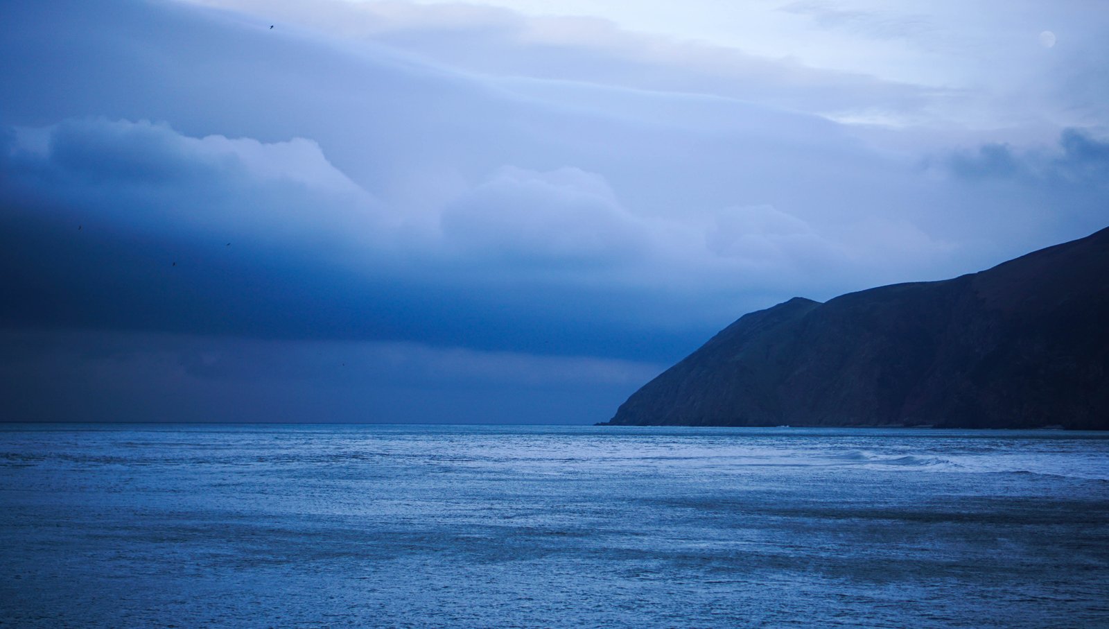 landscape photography of ocean under nimbus clouds Lynmouth 2k 4k 5k