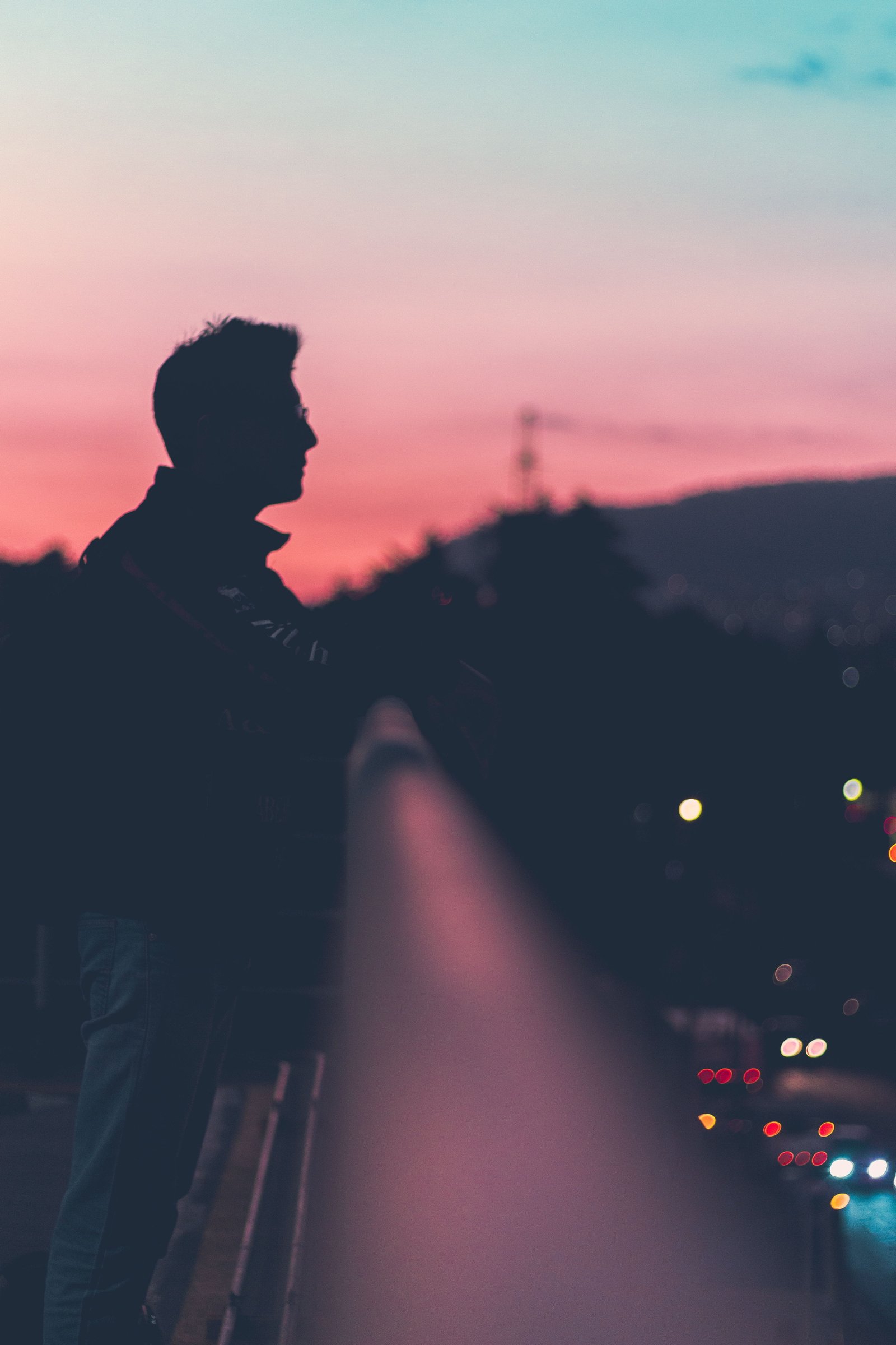 people man guy standing alone dark sunset bokeh sky 2k