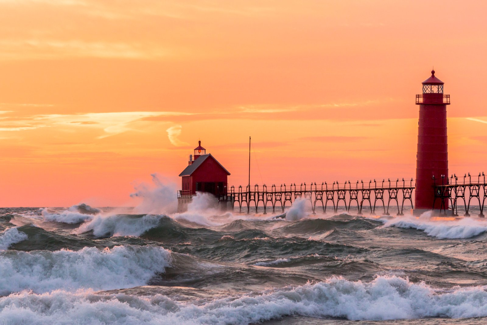 ocean waves near red light house during sunset lake michigan 2k 4k 5k