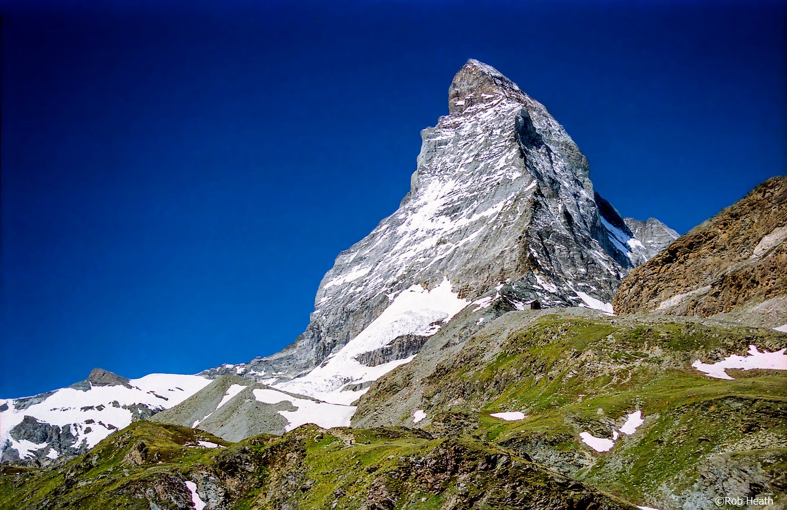 snow covered mountain switzerland rocks ridge 2k