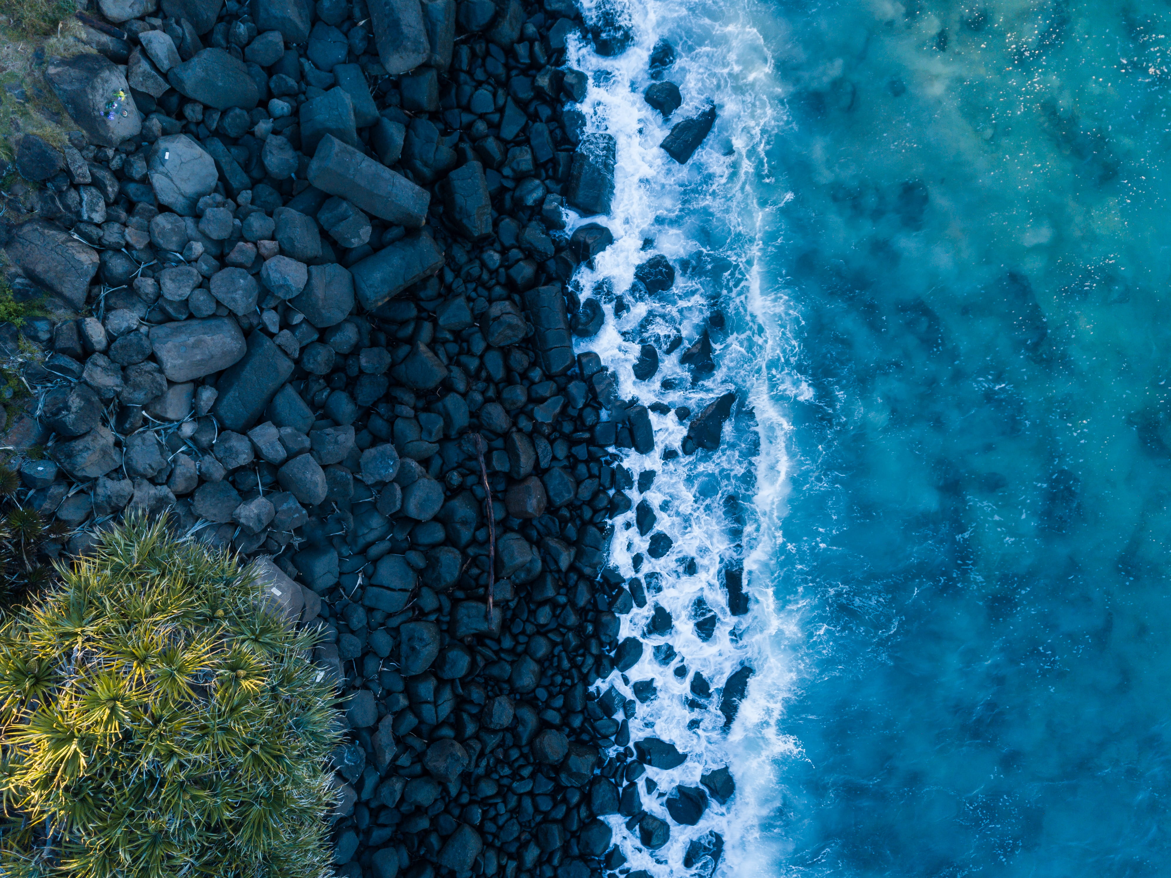 Body Of Water And Rocks aerial shot bird s eye view drone 2k 4k