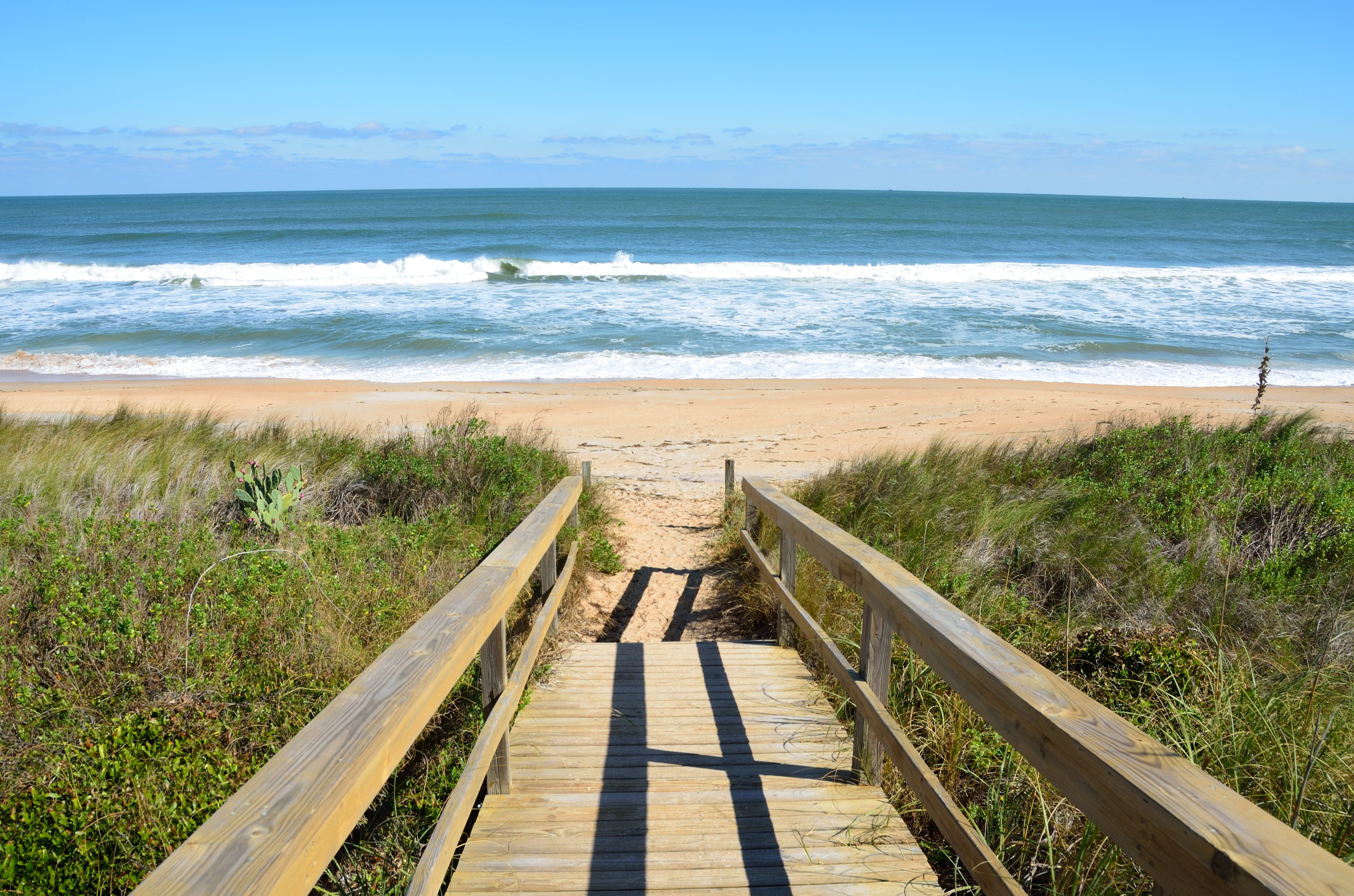 brown wooden dock near seashore beach walkway boardwalk ocean 2k 4k 5k