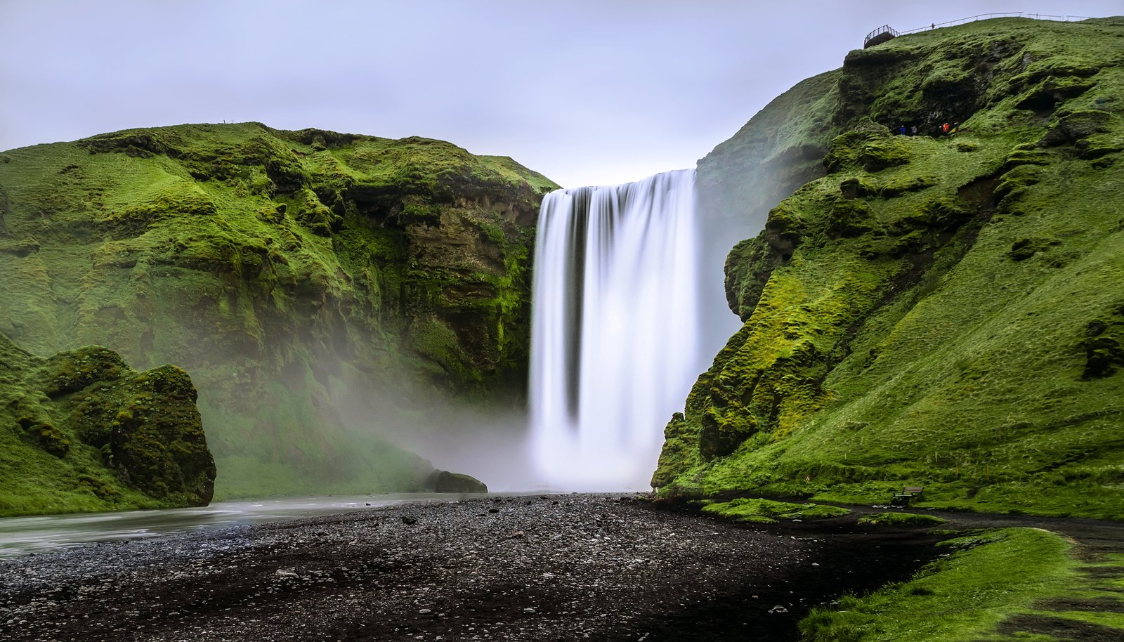 landscape photography of waterfalls on green mountain iceland 2k 4k 5k