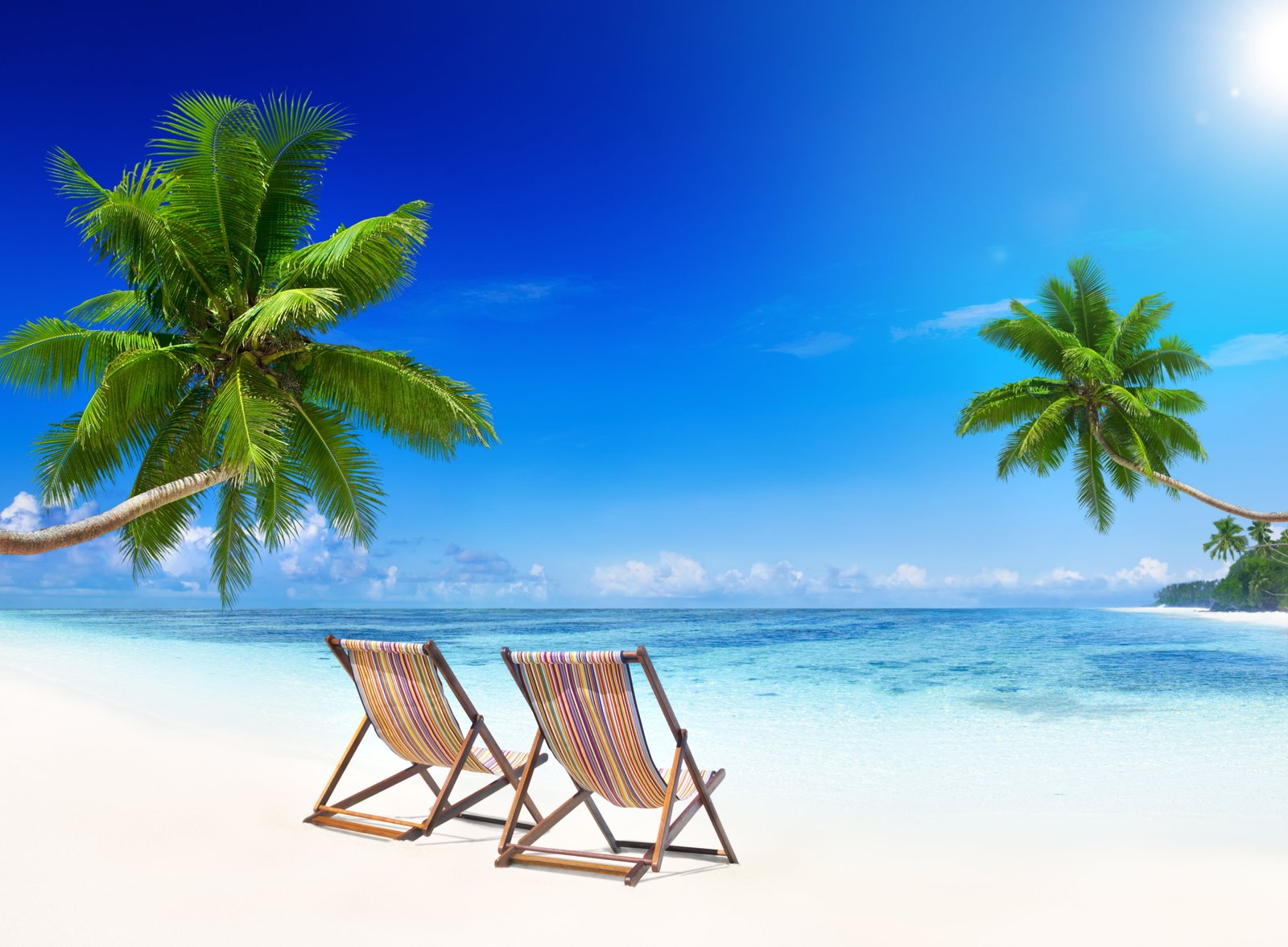 two brown wooden lounge chairs sand sea beach the sun tropics 2k 4k 5k