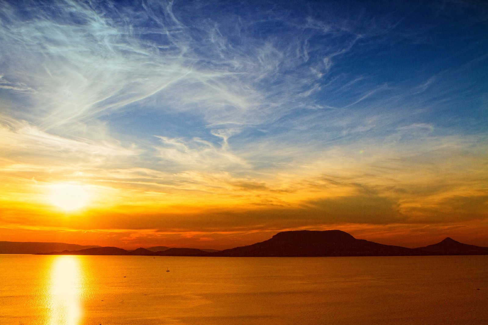 landscape photography of calm waters during golden hour sunset 2k 4k 5k